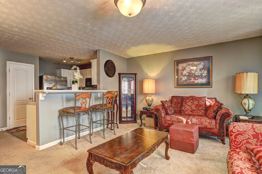Photo of 1015 Magnolia Gardens Walk, McDonough, GA 30253 (MLS # 10821970)