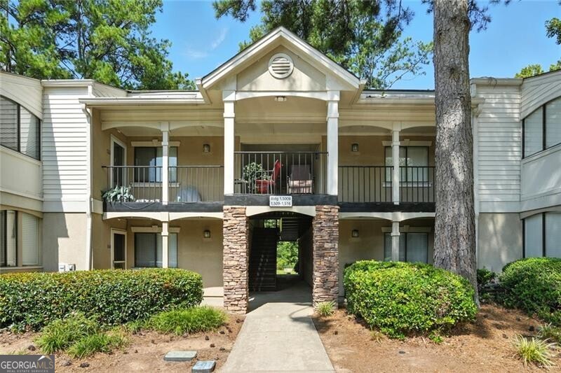 ? Welcome Home to Sandy Springs Living! ? Step inside this fresh and bright 2 bedroom, 2 bath condo with a true step-less entry-perfect for easy living. The roommate-style floor plan offers privacy and space, with both oversized bedrooms large enough to fit a king bed and more. Start your mornings with coffee on the screened-in patio, where lush privacy makes it feel like your own retreat. This gated community has it all-clubhouse, fitness center, pool, tennis courts, and even a dog park. Rental permits are available, making this a smart option for homeowners and investors alike. Unbeatable location: minutes to GA-400, I-285, MARTA, schools, shopping, and dining. Move-in ready and tucked inside a beautifully maintained community-this is Sandy Springs living at its best!