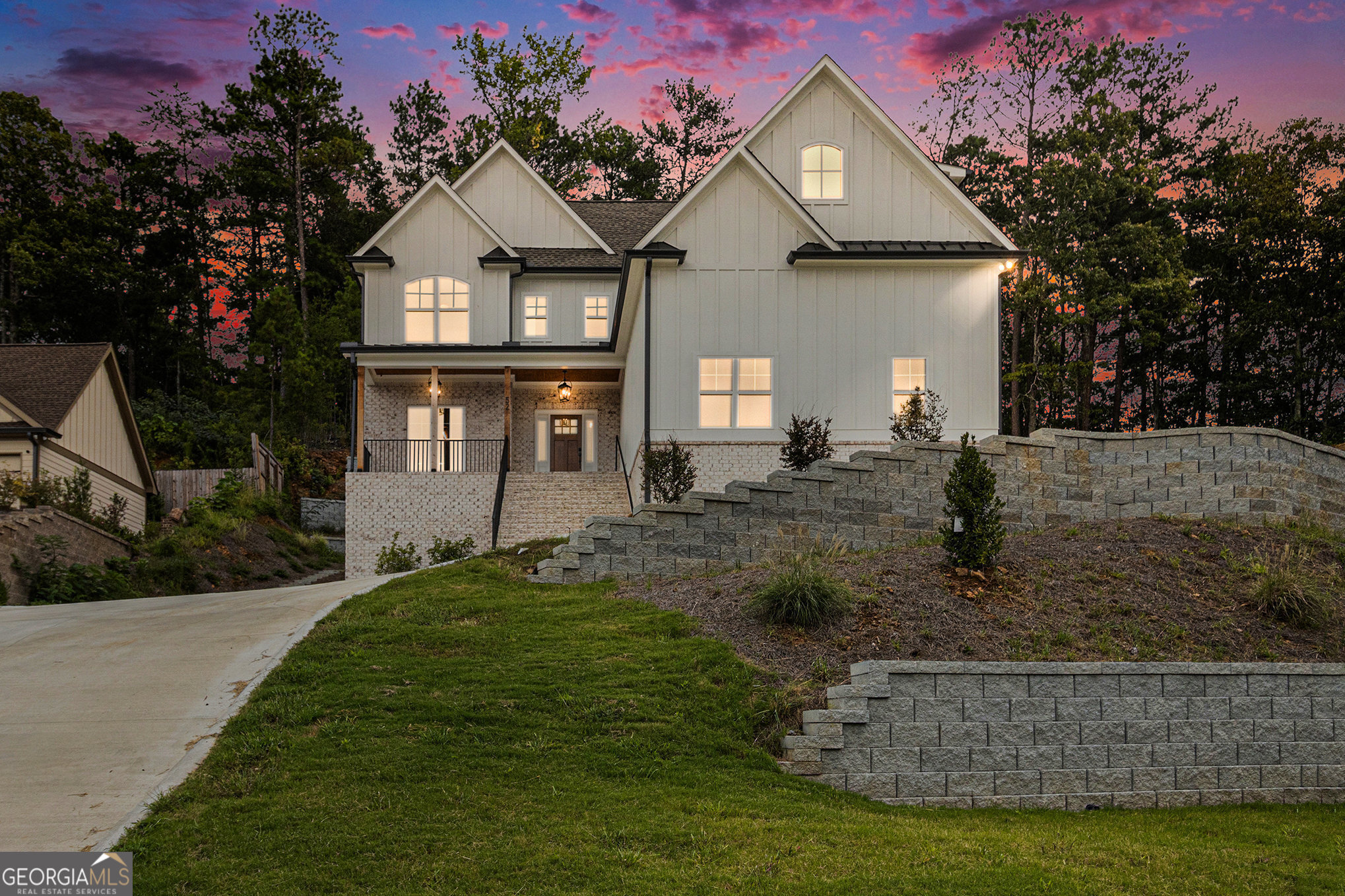 Your Dream Modern Farmhouse Awaits - Lake Views, Luxe Living & Endless Possibilities! Welcome to a home that truly has it all-breathtaking lake views, two luxurious primary suites, and space to create your forever retreat-all in the coveted Spring Lake Shores community of White, GA. Step inside and be wowed by the bright, open layout designed for today's lifestyle. The stunning chef's kitchen-with its oversized island-flows effortlessly into the spacious living and dining areas, perfect for entertaining or cozy nights in. Downstairs, the massive 12-foot ceiling basement is already prepped for your dream build-out-imagine a home theater, second kitchen, or ultimate guest suite! This new built home is nearly complete and awaiting your final touches: choose your preferred walk-in closet layout, bathroom mirrors, refrigerator, and microwave. Nestled on a peaceful cul-de-sac, surrounded by woods and overlooking the lake, this home feels like a luxury getaway-but it's just minutes from I-75, shopping, dining, and all that North Georgia offers. This isn't just another new home-it's a lifestyle, a statement, and the perfect place to start your next chapter.