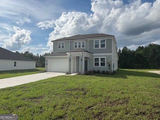 Welcome to our Brand New Gated Community...Northshore On The St. Mary's River. This 4 Bed, 3.5 bath, 2 Car Garage 2-Story Single Family Home on a 1/2 acre is ready for an August/September Completion date. This home has it all being on a huge estate lot in a gated community that backs up to a pond. Back of the property is wooded and then opens to a pond. Clear as much or as little as you want for your pond view. Quartz throughout including chef kitchen, primary bathroom and secondary bathrooms, LVP flooring everywhere except the bedrooms, Shaw carpet in the bedrooms, stairs and upstairs loft. Chef's Kitchen tiled backsplash along with tile throughout in the primary bathroom. Whirlpool Stainless steel appliances in Microwave, Cooktop, Dishwasher, vented hood and wall oven. Northshore community having estate size lots and has a community outdoor screened clubhouse, boat access with a dock, playground, basketball court, and is very private and secluded along the St. Mary's River. Colors and Options may vary. Contact onsite sales with questions.