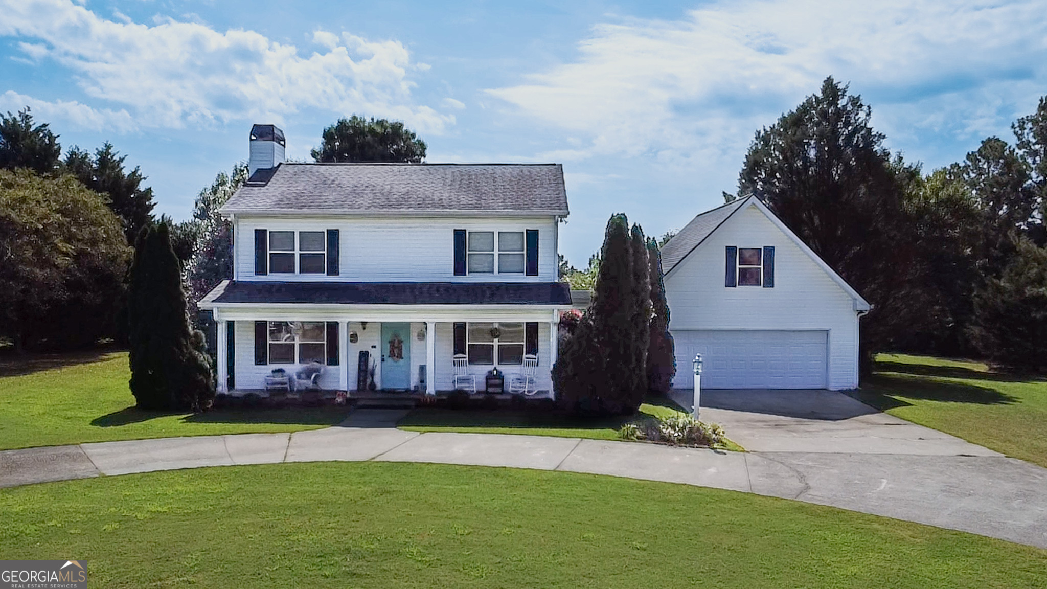 Welcome to this beautiful 4-bedroom, 2.5-bath home situated on 2 serene acres, complete with an inground pool and outdoor half bath for convenience. Inside, you'll find a spacious layout designed for both comfort and entertaining, including a cozy wood-burning fireplace, double ovens in the kitchen, and inviting front and interior porches. The home also features a game room over the 2-car garage with automatic doors, perfect for recreation or extra living space. Outdoor living shines with a circle driveway, charming gazebo, and plenty of room to gather around the pool. A true retreat with space and style, ready for its next owners to enjoy!