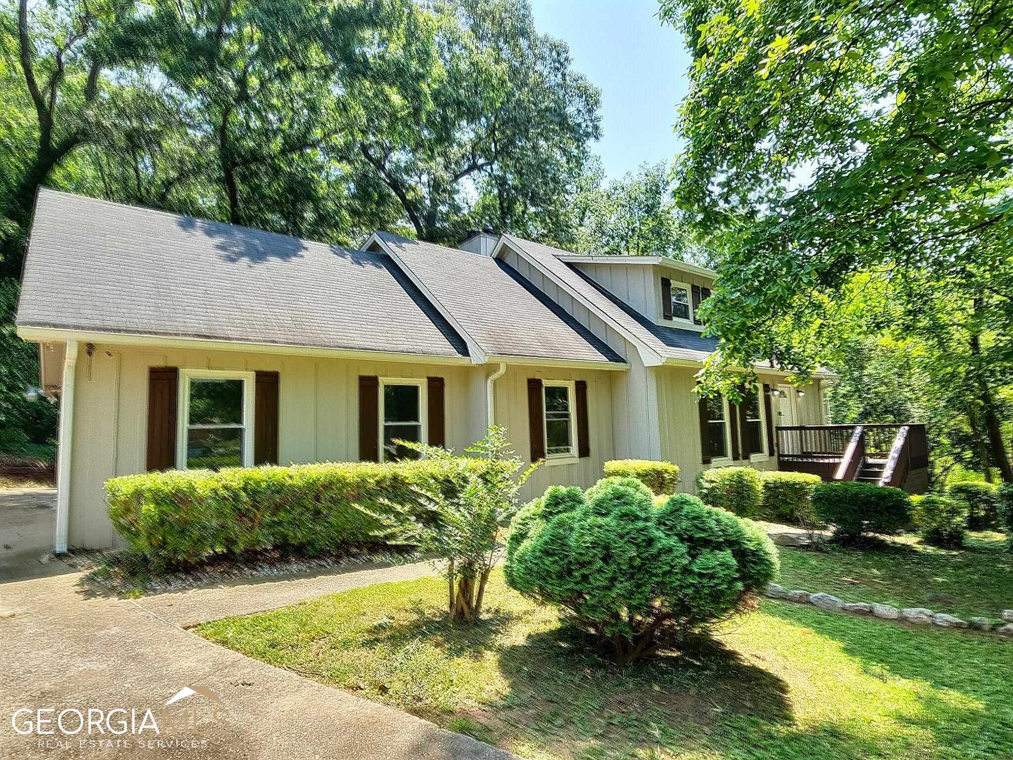 Plenty of Space for you and your family!! Have you been looking for affordable living space without restrictions? Then come see this remodeled 4 bedroom 3.5 bath home in the well known neighborhood Hidden Hills. Main bedroom is located on the first floor adjacent to family room with other bedrooms located on the 2nd level. Huge deck for those summer bbqs and basement level that is clean and awaiting your creativity. Home includes fresh paint through-out as well as new carpet and marble floors in kitchen and bathrooms. New electrical work was just completed/inspected and passed by Dekalb County. Home is also in cul de sac area where the shade keeps those summer heating bills to a minimum. Plenty of parking space with a landscaped front yard with definitely appeal to those who love spending time outside. Come see your new home today and make us an offer!