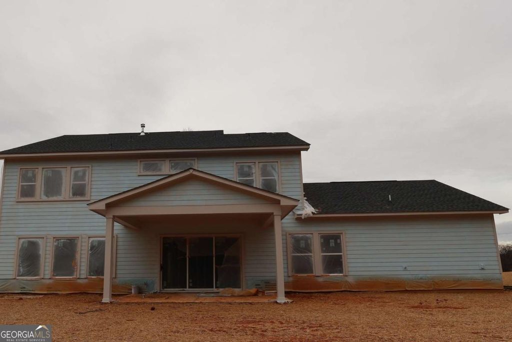 Photo of 7395 Magnolia Crest Ln, Cumming, GA 30028 (MLS # 10696931)