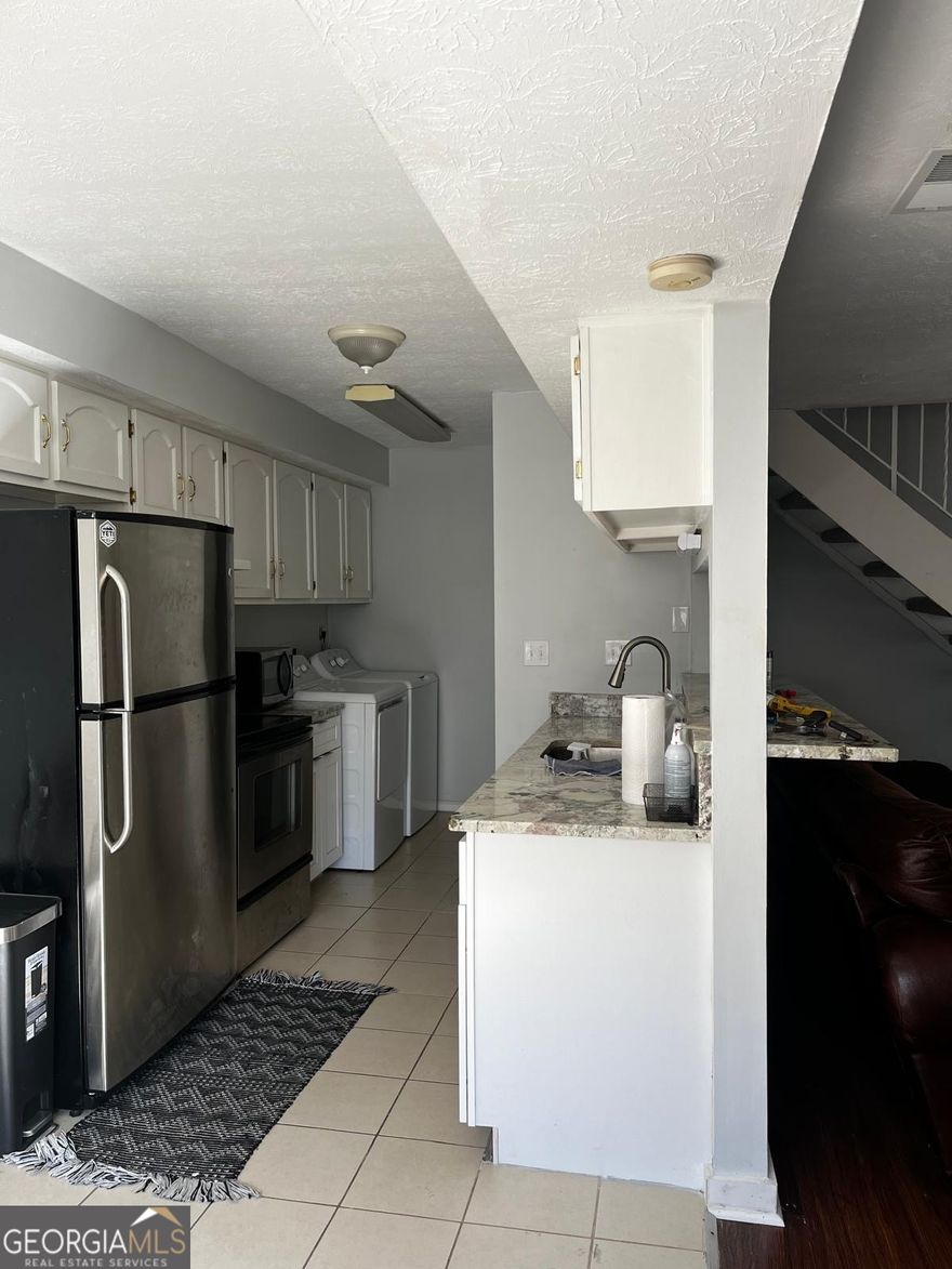 Make this 3 bedroom 1 bath condo your own today. Close to everything which include: Kennesaw State university, shopping, restaurants, and Truist Park by The Battery.