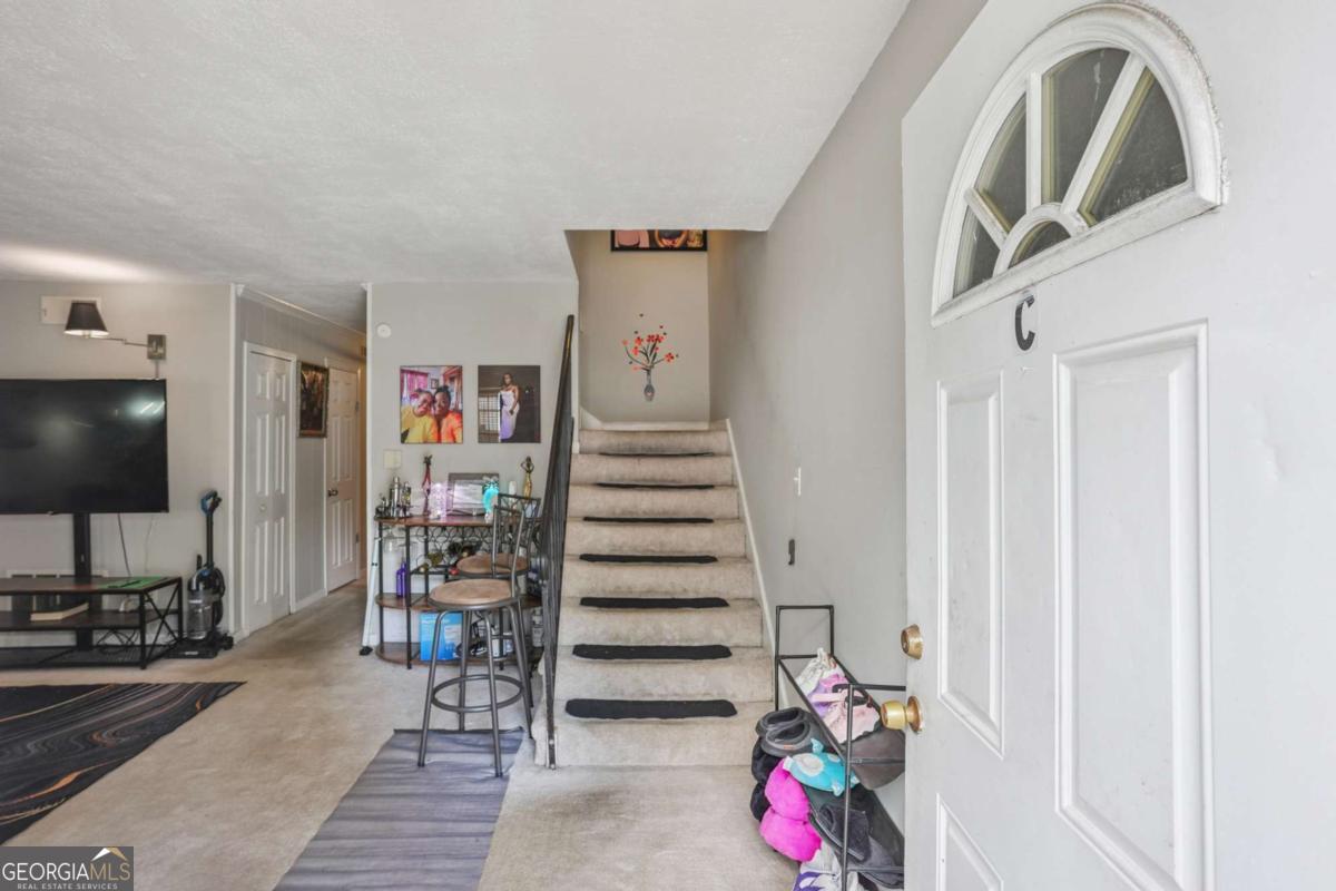 Step into this beautifully maintained all-brick condo that's truly clean and turnkey. The home features tall ceilings that create a bright, open feel, along with a nice patio perfect for relaxing or entertaining. Every detail reflects a very well-kept property, making it an ideal move-in-ready option for any buyer.