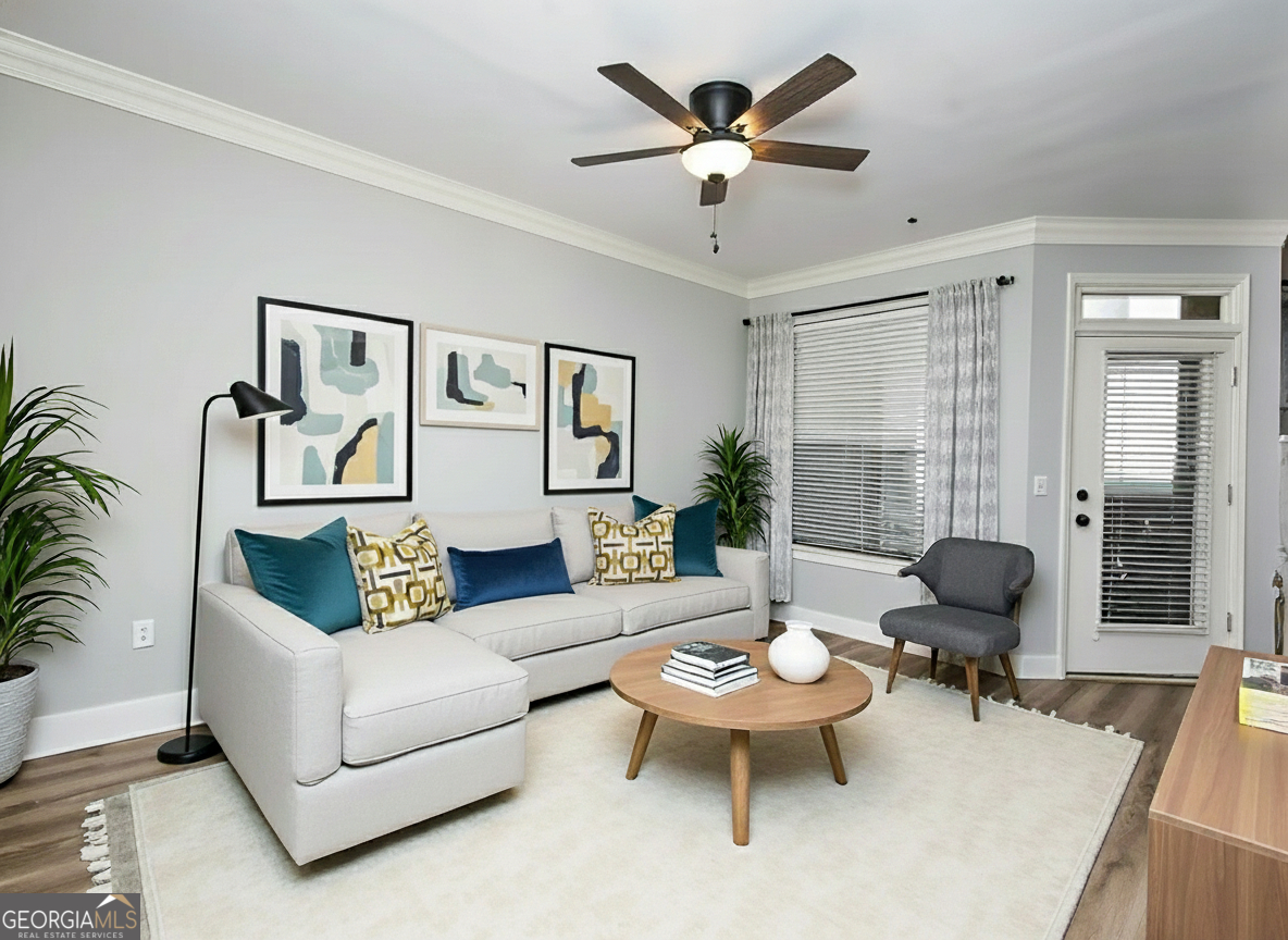 Welcome to effortless living in the heart of Brookhaven, where modern convenience meets low-maintenance living. This exquisite unit is perfect for those seeking a stylish and comfortable living space with amenities that cater to an active, social lifestyle. The well-appointed interior features 2 year old LVP flooring that sets the stage for a warm and inviting atmosphere. The bathroom is a haven of relaxation, boasting a newer double vanity for ample space and a tiled garden tub/shower to unwind after a long day. A full-size washer and dryer are included, ensuring laundry days are a breeze.  Water heater and Furnace are 5-6 years old.  Natural light pours in through large windows, highlighting the unit's first-floor location, which opens to common areas, inviting you to mingle with neighbors or enjoy a quiet evening at home. Step outside and you'll discover a vibrant community complete with a dog park, pool, and a clubhouse that boasts a two-story workout center, business center, meeting area, movie room, and game room. Storage is abundant with two large walk-in closets, giving you the flexibility to convert one into a cozy home office. The built-in shelves in both the foyer and bedroom add character and provide the perfect display for your favorite keepsakes, while the granite counters and stainless steel appliances in the kitchen will inspire your inner chef. A handy pantry and coat closet offer additional storage solutions. Crown molding in every room accent the walls that were painted  Agreeable Gray only a few years ago. Protected by a gated entrance with an attentive gate attendant, your peace of mind is assured. Covered garage parking on the first floor makes coming and going seamless, rain or shine.  This unit also offers easy access to the Handicapped parking. Peachtree Place has rare visitor parking in all parking garages, your guests  can easily park when they visit. Nestled in a supremely convenient location, you'll find yourself down the street from the new Brookhaven City Hall, Brookhaven Marta, and a plethora of dining, shopping, and entertainment options. Excellent schools and the option to navigate this charming area without a car amplify the allure of this well-maintained complex. This FHA and VA approved condo is more than a home-it's a lifestyle waiting for you to embrace with low Dekalb County Taxes.