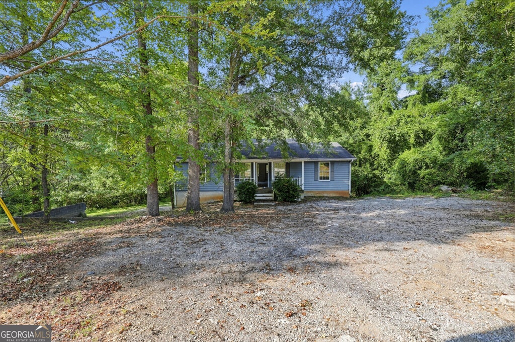 Photo of 7694 Rockbridge Road, Lithonia, GA 30058 (MLS # 10847374)