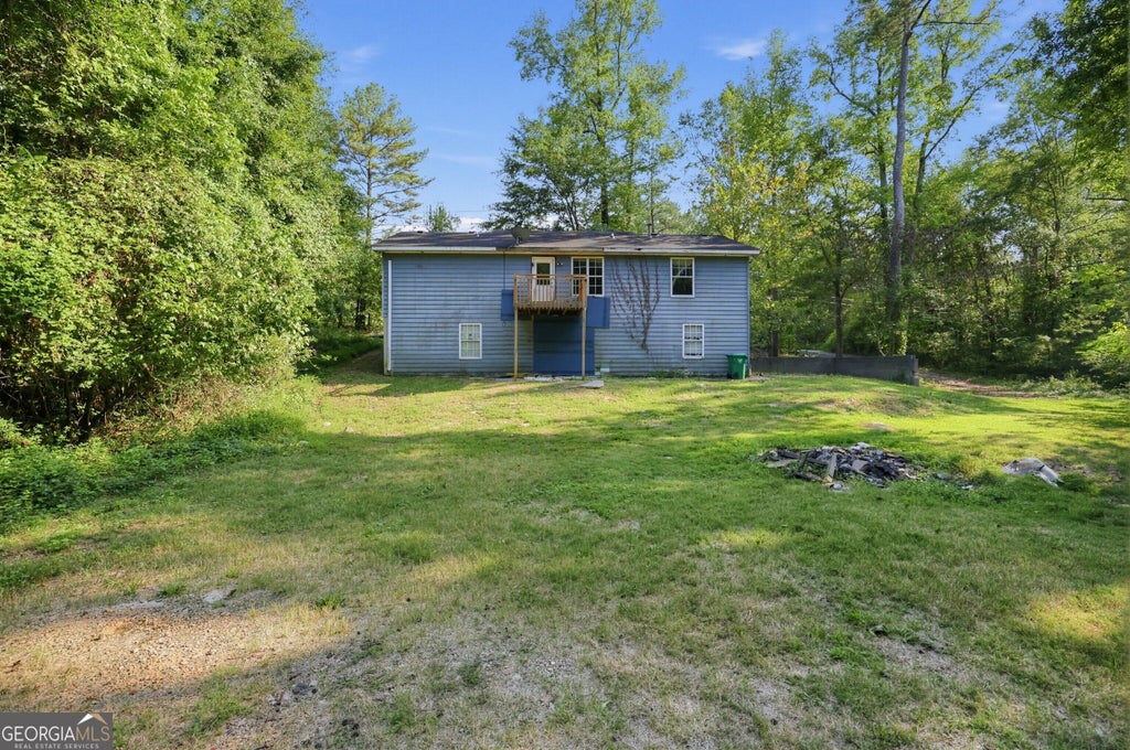 Photo of 7694 Rockbridge Road, Lithonia, GA 30058 (MLS # 10847374)