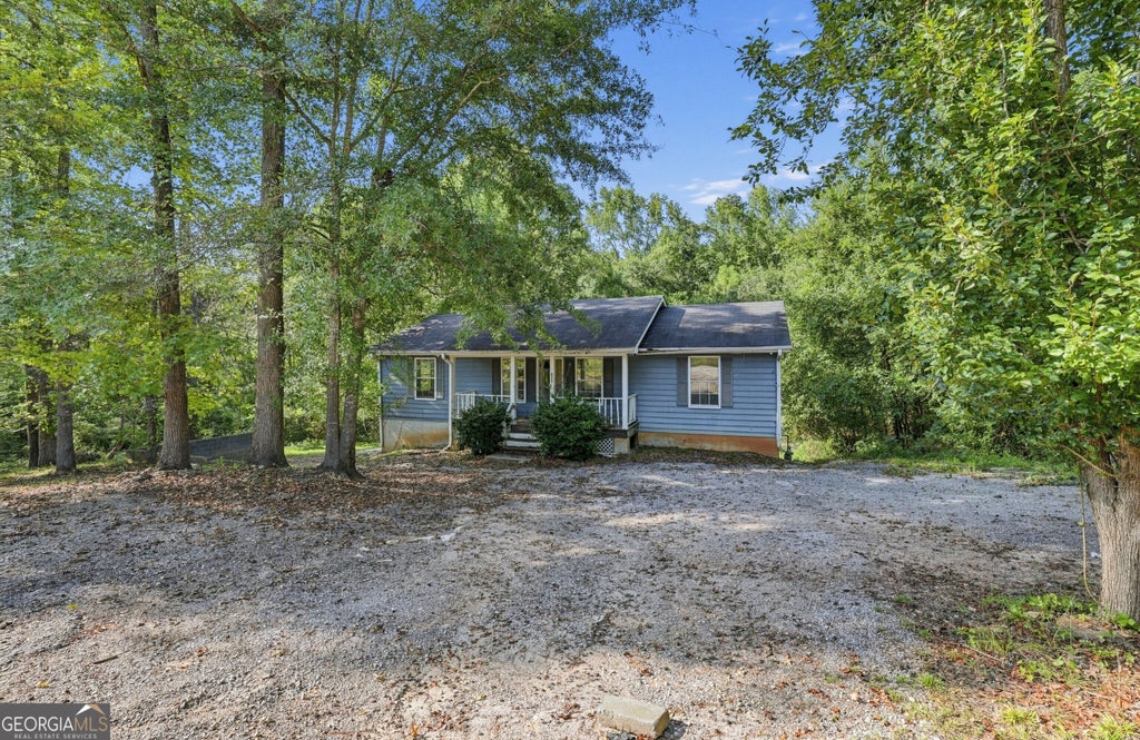 Photo of 7694 Rockbridge Road, Lithonia, GA 30058 (MLS # 10847374)