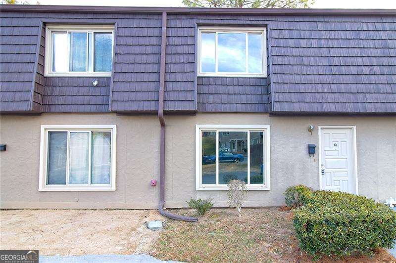 3/2 Buydown Available! Secure a Lower Interest Rate & Save Big! Discover comfort, style, and savings in this energy-efficient townhome-now with an exclusive 3/2 buydown incentive from our preferred lender! This 2-bedroom, 1.5-bathroom gem is designed for year-round comfort with a brand-new high-efficiency HVAC and advanced privacy windows that flood the home with natural light while keeping your energy costs low. Beyond the home itself, stress-free living awaits-your HOA covers water, gas, sewer, exterior maintenance, pest control, trash, and amenities including a pool, tennis courts, and a dog park. Prime Location - Just minutes from Life University, Kennesaw State, and The Battery, with easy access to major highways, shopping, and dining. Convenience at Your Doorstep - Two assigned parking spaces plus ample guest parking. Inside, you'll love the fresh LVP flooring, modern color palette, and move-in-ready feel. The dining room overlooks a newly fenced, private backyard ideal for morning coffee or weekend BBQs. Upstairs, two spacious bedrooms feature walk-in closets, carpeting, and a full bathroom. The practical yet stylish kitchen offers ample cabinet space, while the oversized laundry room provides extra storage. Take advantage of the price adjustment and this rare lender incentive before it's gone! Schedule your tour today