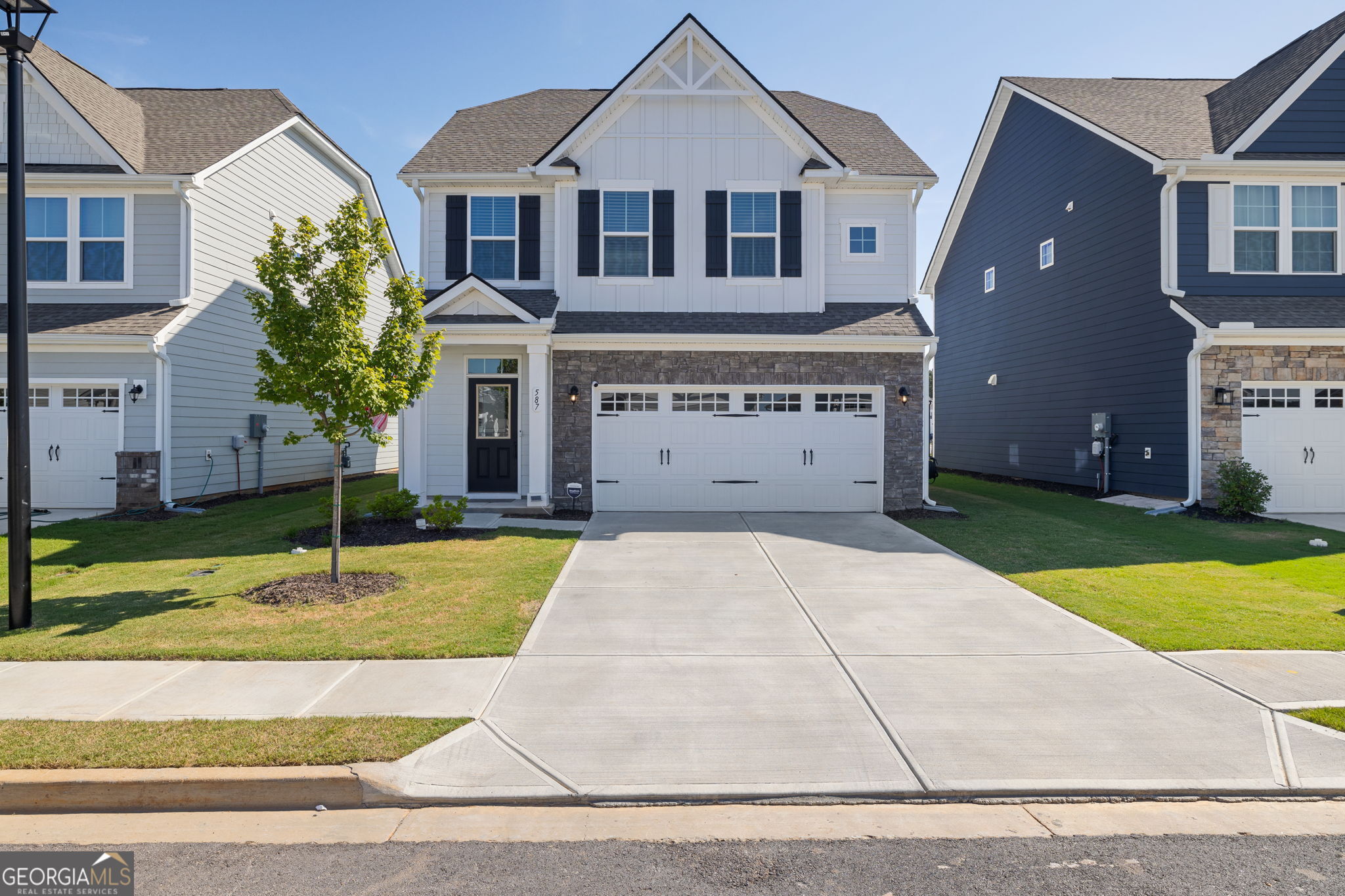 Welcome to 587 Gunter Dr, a beautifully maintained 3-bedroom, 2.5-bathroom home located in the sought-after Twin Lakes community in Hoschton, GA. This spacious home offers a perfect blend of modern amenities and classic charm, making it the ideal choice for anyone seeking comfort and style. 3 Bedrooms, 2.5 Bathrooms - Room for everyone, with ample closet space and cozy bedrooms. Open-Concept Living - A bright and airy floor plan with seamless transitions between the kitchen, dining, and living areas. Chef's Kitchen - A well-equipped kitchen featuring modern appliances, granite countertops, and plenty of cabinet space for storage. Master Suite Retreat - The large master bedroom includes a walk-in closet and an en-suite bathroom with a double vanity, garden tub, and separate shower. Private Backyard - A serene and private outdoor space perfect for entertaining or relaxing. Bonus Space - A versatile bonus room ideal for a home office, playroom, or additional living area. Located just minutes from shopping, dining, and entertainment options, this home offers the perfect balance of suburban tranquility and convenient access to everything you need. Don't miss out on the opportunity to make this home yours!