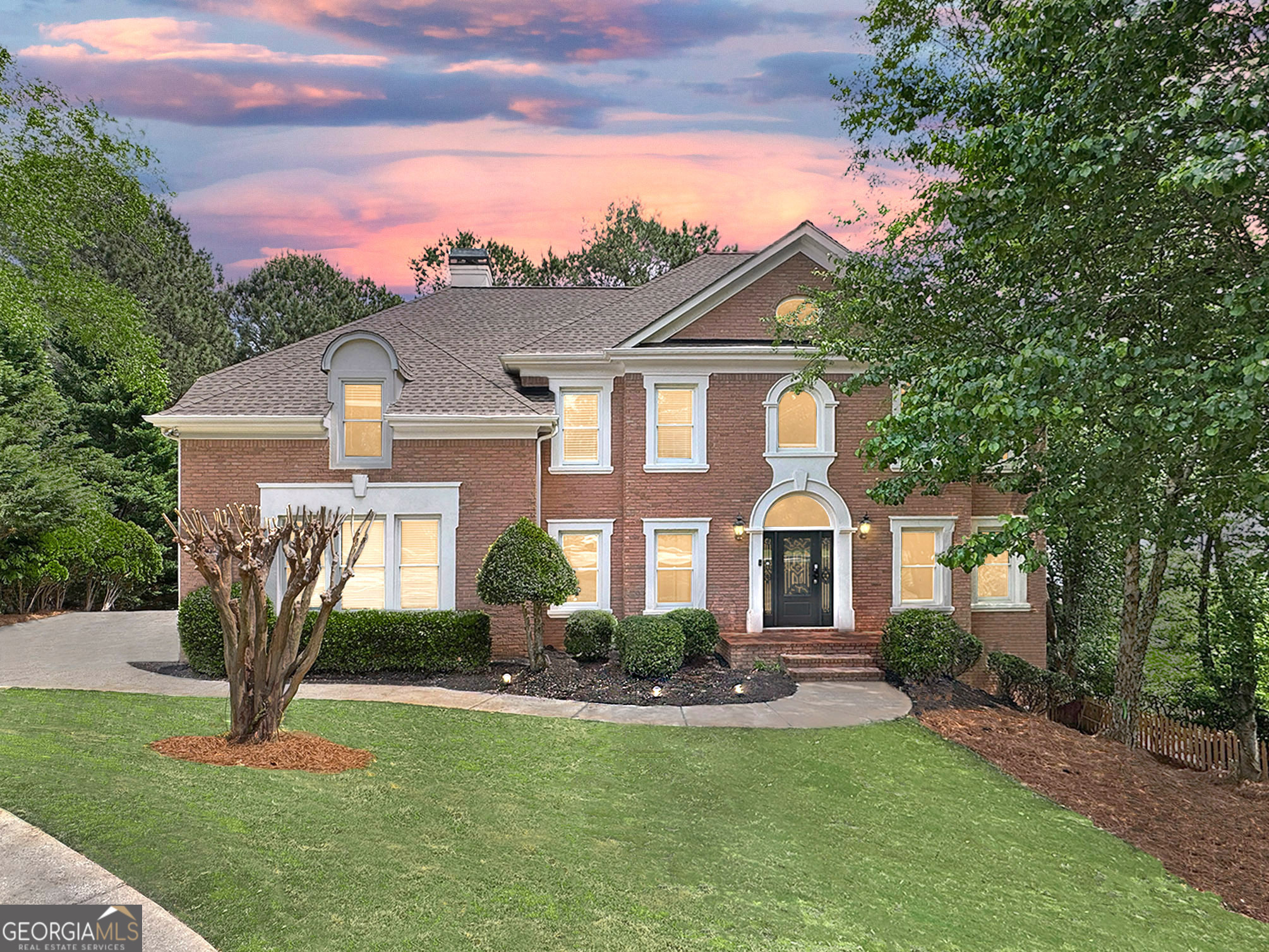 WOW! This is the one you've been waiting for! You will love this stately 6 bed, 5 bath, 4-sided brick, move-in ready traditional home with loads of natural daylight, guest suite on the main level, updates throughout, full finished daylight terrace level and more, all situated on a quiet cul-de-sac in the highly sought-after Alpharetta/Johns Creek swim/tennis community of Chartwell! The spacious main living level offers a formal living room, formal dining room, large guest bedroom, updated full bathroom, laundry room with utility sink, and the fabulous updated kitchen complete with quartz countertops, stainless appliances, double oven, pantry, and adjacent breakfast area open to the striking vaulted fireside family room, all overlooking the peaceful, private tree-lined backyard! Upstairs, you'll find three spacious guest bedrooms, two guest bathrooms, and the oversized retreat-like primary suite with trey ceiling detail, fireplace, and the renovated spa-like ensuite bath featuring a double vanity, walk-in shower, and separate centerpiece soaking tub! The full, finished daylight walk-out terrace level includes an additional family room, media room, bonus space, guest bedroom, and full guest bathroom! This home offers plenty of opportunity for outdoor entertaining with an expansive, low-maintenance Trex deck on the main living level, and a green space for additional activities! Driveway parking pad provides space for multiple cars or basketball play. Chartwell community includes pool, tennis courts, clubhouse, playground, and a community lake, and is located just steps to Newtown Park, shopping, restaurants, and more! Easy access to GA 400! DON'T WAIT, be sure to schedule your showings ASAP!