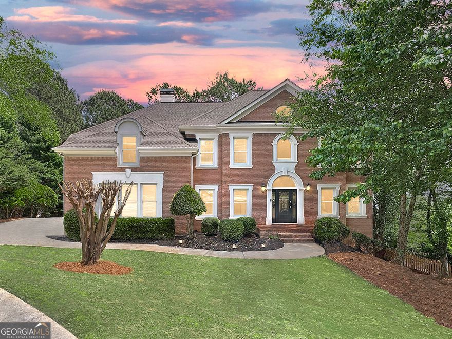 WOW! This is the one you've been waiting for! You will love this stately 6 bed, 5 bath, 4-sided brick, move-in ready traditional home with loads of natural daylight, guest suite on the main level, updates throughout, full finished daylight terrace level and more, all situated on a quiet cul-de-sac in the highly sought-after Alpharetta/Johns Creek swim/tennis community of Chartwell! The spacious main living level offers a formal living room, formal dining room, large guest bedroom, updated full bathroom, laundry room with utility sink, and the fabulous updated kitchen complete with quartz countertops, stainless appliances, double oven, pantry, and adjacent breakfast area open to the striking vaulted fireside family room, all overlooking the peaceful, private tree-lined backyard! Upstairs, you'll find three spacious guest bedrooms, two guest bathrooms, and the oversized retreat-like primary suite with trey ceiling detail, fireplace, and the renovated spa-like ensuite bath featuring a double vanity, walk-in shower, and separate centerpiece soaking tub! The full, finished daylight walk-out terrace level includes an additional family room, media room, bonus space, guest bedroom, and full guest bathroom! This home offers plenty of opportunity for outdoor entertaining with an expansive, low-maintenance Trex deck on the main living level, and a green space for additional activities! Driveway parking pad provides space for multiple cars or basketball play. Chartwell community includes pool, tennis courts, clubhouse, playground, and a community lake, and is located just steps to Newtown Park, shopping, restaurants, and more! Easy access to GA 400! DON'T WAIT, be sure to schedule your showings ASAP!