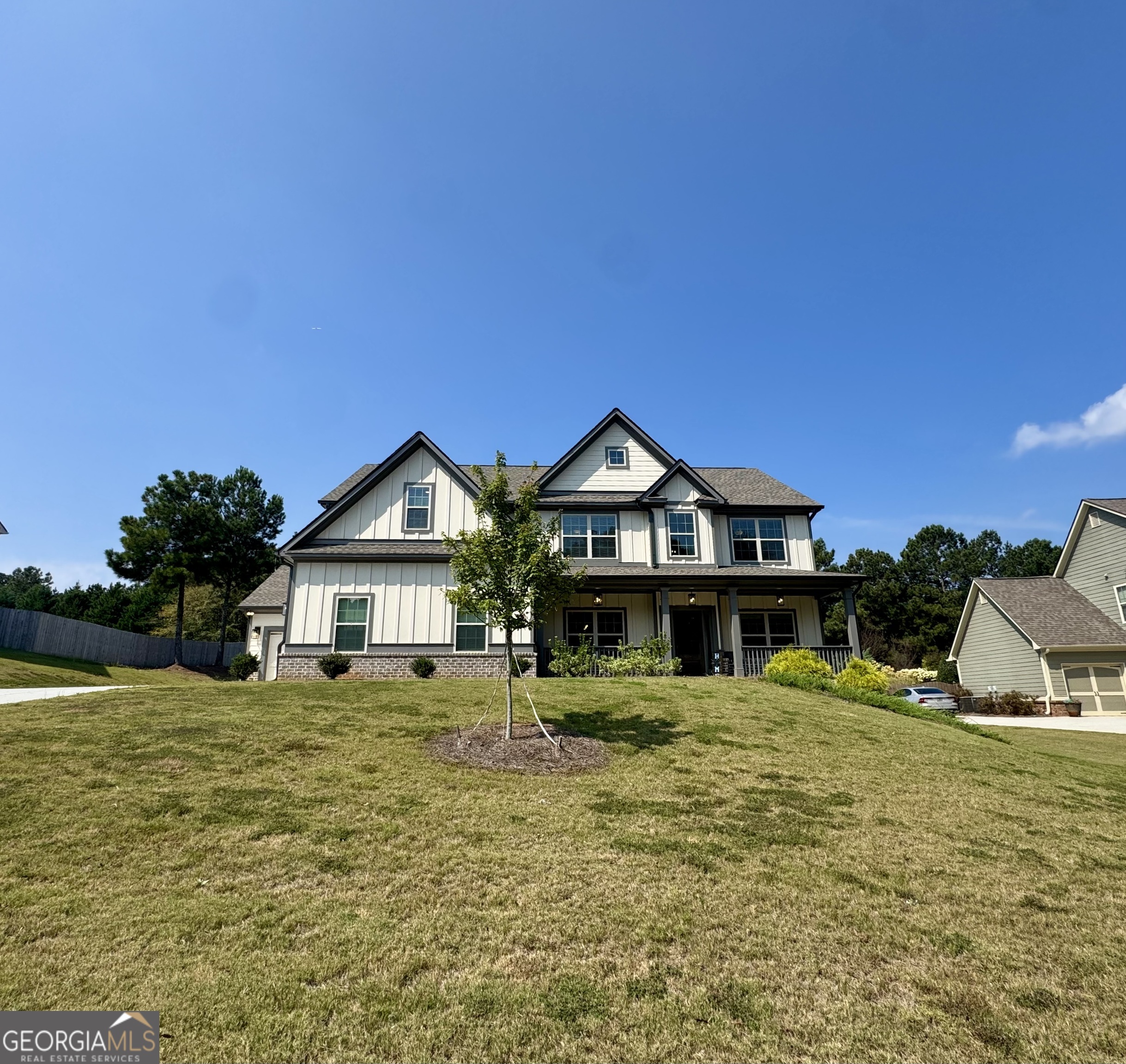 This 5 bedroom/4 full bath. Home features an entry foyer, separate dining room, office/study, when you enter the home. The main floor also boast a spacious kitchen with an island and quartz counter tops, the breakfast area that overlooks the family room..guest bedroom and full bath on the main. The owner's suite on the second level includes his/hers walk-in closets, and a private bath with his/hers vanities, garden tub, and tiled shower. Upstairs are 3 secondary bedrooms, a full bath, and laundry room. This home includes a 3 car garage side garage, and covered porch.