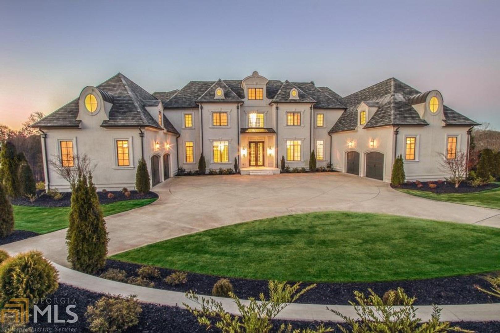 LA living w/European sophistication at its finest exemplifies luxury living w/seamless blend of indoor & outdoor living space,Walls of windows,12ft Ceilings,Gourmet kitchen views fireside keeping rm w/barrel roll Venetian plaster ceiling,caterer's Kitchen,Master Suite w/fireside sitting area,Balcony,spa like bath w/custom closets,Terrace Level Features back-lit Onyx bar,wine cellar,Fitness center,Sauna,home office,billiards rm,Stone Arches,private grounds views lake & hotel size salt water pool/spa w/swim-up bar,summer/Kitchen,security/audio system,Indoor sports Court