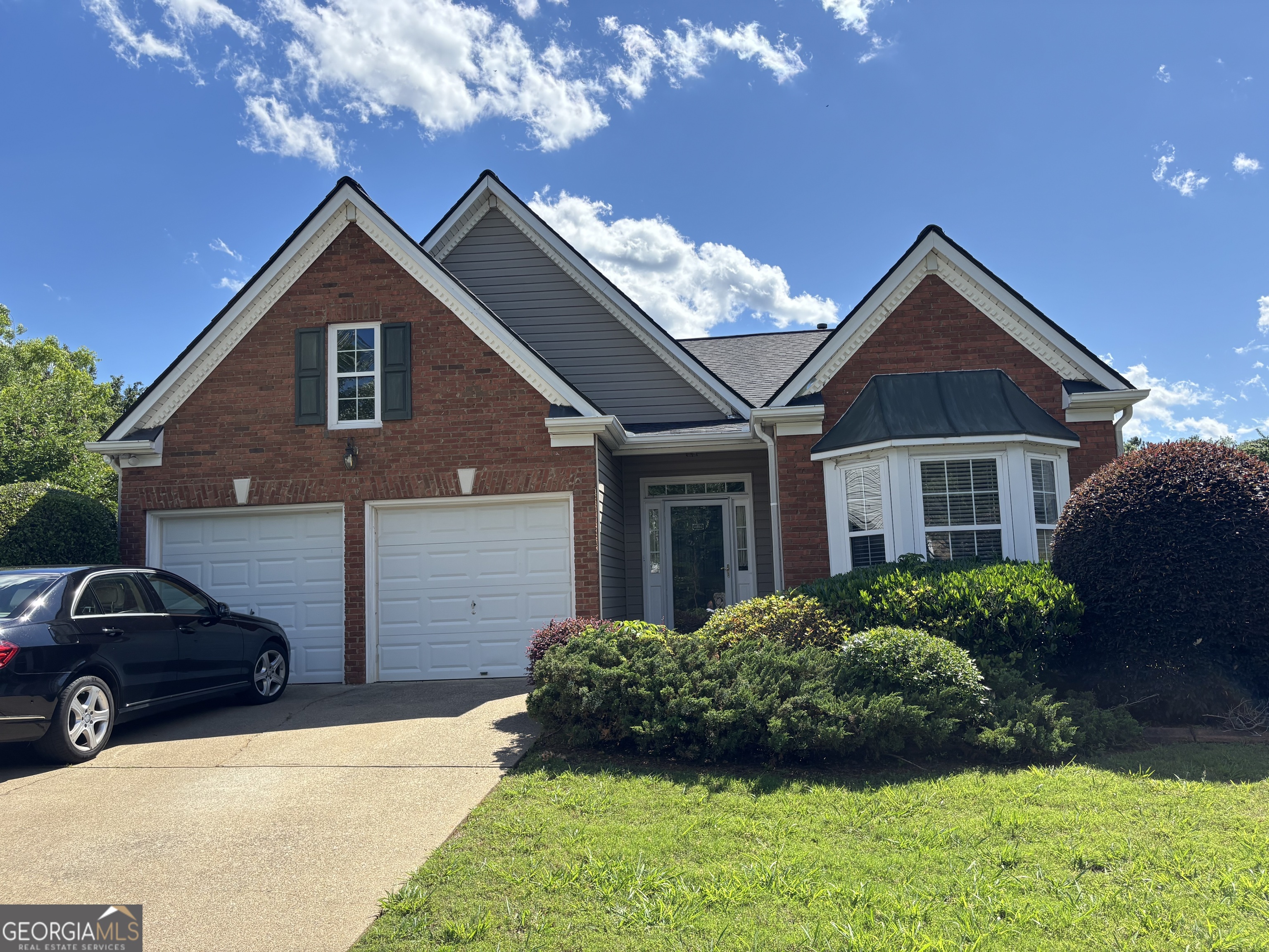 Perfect rental opportunity. Great location right off Hwy 92 close to shopping and restaurants. Located in a cul-de-sac this Brick and vinyl ranch home is easy to maintain. Hardwoods and carpeted bedrooms. 2 Car Garage and Private Fenced Backyard. Family Room with fireplace and kitchen with black appliances with refrigerator already in place. This one is ready for immediate occupancy. No Pets.
