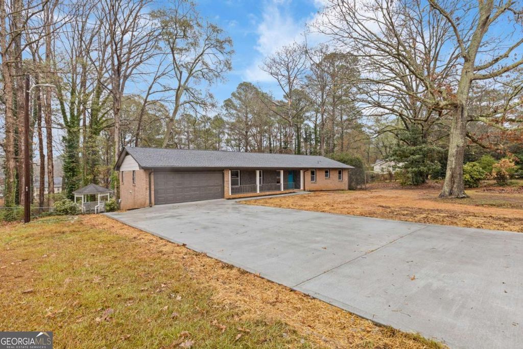 Photo of 2224 Hudson Drive SW, Lilburn, GA 30047 (MLS # 10725402)