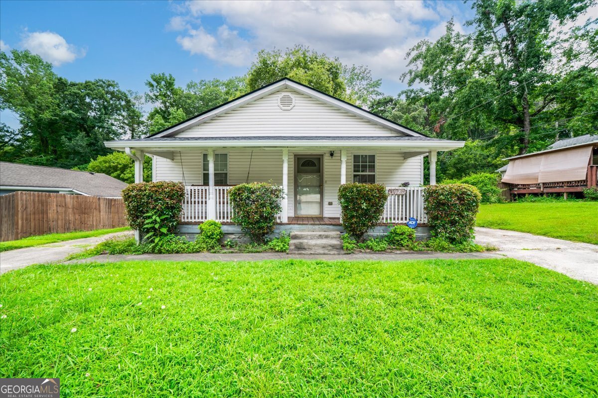 Have you been holding out for the Riverside opportunity? This. Is. It. Three bedrooms, two full baths, and endless potential to make it your own. Imagine starting your day on the front porch swing, coffee in hand, soaking in the charm of this friendly neighborhood. Original hardwoods add character, and the cutest double-sided fireplace is ready to steal the show. Sitting pretty on a large rectangular lot, this home is perfect to customize for yourself or as an investment. Plus, you can stroll to Riverside favorites like Frazie's Meat & Market, Bar Haus, and Bellwood Coffee. Bring your vision, because this gem is being sold as-is.
