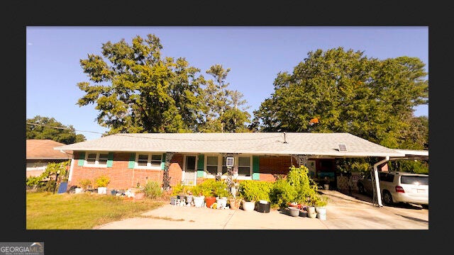 Photo of 1882 Lake Harbin Rd, Morrow, GA 30260 (MLS # 10882373)
