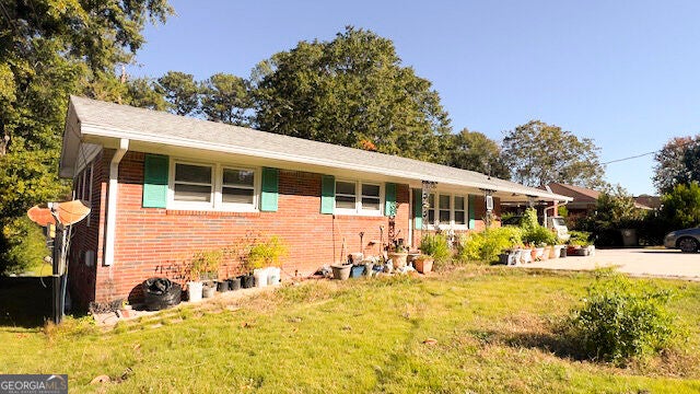 Photo of 1882 Lake Harbin Rd, Morrow, GA 30260 (MLS # 10882373)