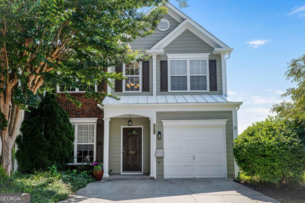 Welcome home to this wonderful end-unit in sought after Park at Windward Village. Just minutes from the all the shopping and eateries you will love. This unit features new flooring and new countertops throughout. You will love the open floorplan with the kitchen as the centerpiece of the main floor. 2-story formal living room with large built-in bookshelves, separate dining room, and family room with gas fireplace. From the kitchen, walk out onto your private patio. Perfect for your garden and summertime BBQ's! Upstairs is a large master bedroom with vaulted ceilings. Primary bathroom features new floors, new countertops, and soaking tub. Two guest bedrooms share the guest bath with new floors and vanity. Need to cool off this summer? Take a dip in the large community pool with plenty of shaded seating. Don't miss the community playground for the kiddos.