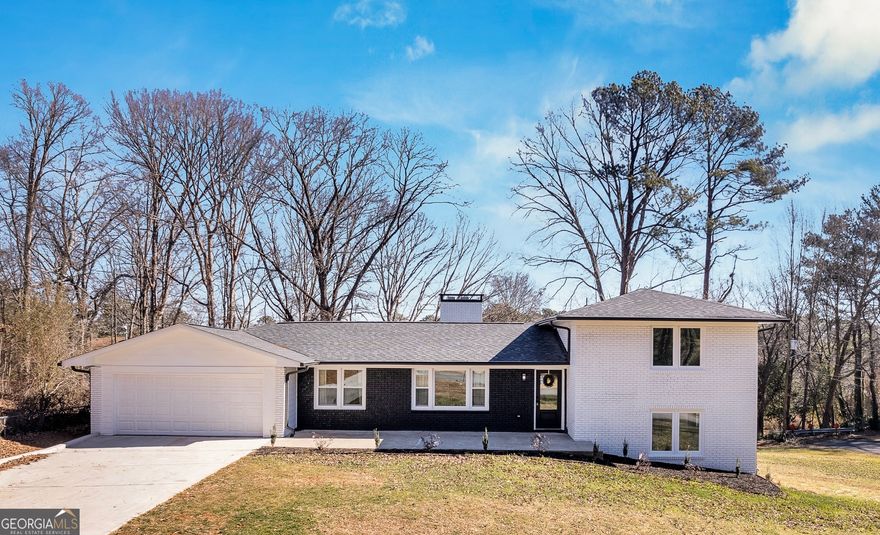 Motivated seller !! This renovated home originally built in 1963, has been rebuilt from the studs out! Every detail has been updated, including NEW ROOF, 2 NEW HVAC UNITS, NEW TANKLESS WATER HEATER. NEW WIRING AND ELECTRICAL PANEL, NEW INSULATION, NEW WINDOWS, NEW FLOORING, NEW PLUMBING, NEW LIGHTING AND SO MUCH MORE! Not only is this house beautiful, it will offer it's new owners peace of mind for many years to come.   Sitting on a corner lot, it offers an abundance of space and natural light, thanks to its open layout. The home has been freshly painted with colors selected by a professional interior designer, adding a modern touch to every room. This house exudes warmth and comfort, while the stylish design complements the entire home. The fully finished basement provides even more living space-whether you need an extra bedroom, office, or recreation room, it's a versatile space for all your needs.   Outside, you'll enjoy a huge backyard, perfect for outdoor gatherings, play, or simply relaxing. The home is located in a quite neighborhood, in the top-rated Walton School district.    Don't miss out on this opportunity-schedule your appointment today and experience it for yourself