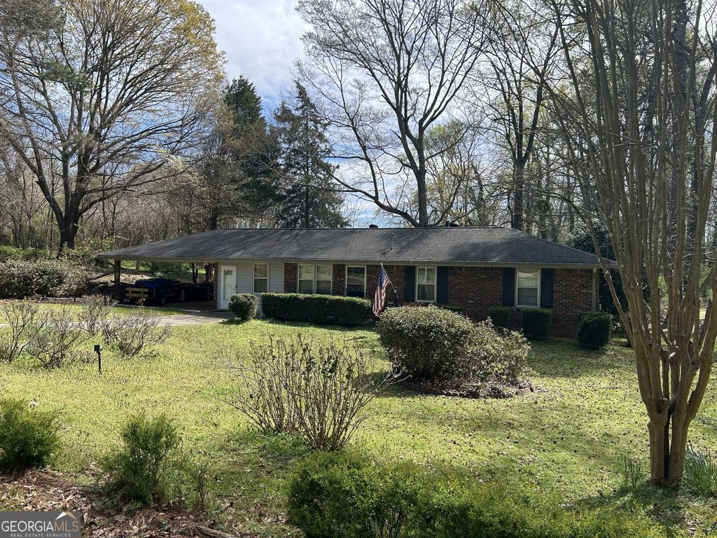 Photo of 4884 Maurice Drive NW, Lilburn, GA 30047 (MLS # 10715367)
