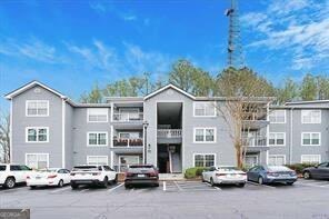 Welcome this move-in ready renovated condo! This 3 bedroom/2 bath home has all new Interior paint, new Luxury Vinyl plank flooring in bedrooms, new windows, brand new patio door, new microwave, dishwasher, building new roof and updated Bathrooms. The Large Living Room welcomes you as you enter with hardwood floors along with a Designated Dining Area and a Kitchen over looking into the Living Room. The kitchen is beautifully upgraded with granite countertops. With bedrooms positioned on opposite ends of the unit, this layout offers flexibility for roommates or families. Both Bedrooms are Large allowing for Lots of Space. Each bedroom boasts a spacious walk-in closet and private ensuite bath. Adjacent to the kitchen, you'll find the convenient laundry room. Nestled in a gated community, Enjoy Neighborhood Amenities including a Pool, fitness center, and clubhouse. Enjoy the low-maintenance lifestyle in a convenient location with convenient access to walking trails, shopping, dining, parks, schools, day care centers, entertainment facilities. Just 2.5 miles to North Springs Martha station and about half a mile to the bus stop and to North Springs High school and get anywhere around town with easy access to Roswell Road, GA400 and I-285! Take advantage Newly built, scenic walking trail passing through the community that leads to banks of Chattahoochee river. Schedule your tour asap to see everything it has to offer! Don't miss this beautiful home!