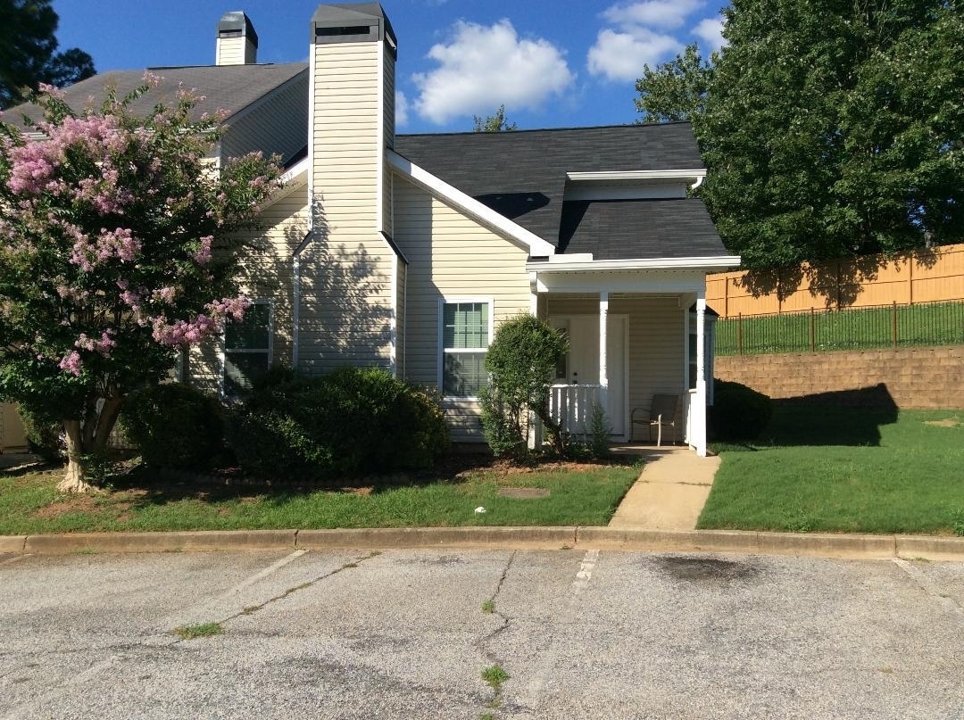Great 2 year lease purchase opportunity. Move in now while preparing to purchase. 2 Bedroom 2 bath. Large end unit Townhome with 2 story vaulted living room with fireplace. Bay window in dining area. New kitchen cabinets and appliances. The entire upstairs is a huge one-bedroom suite with private bath and big walk-in closet. Bedroom down has a custom closet. Total renovation with new laminate, tile and carpet flooring.