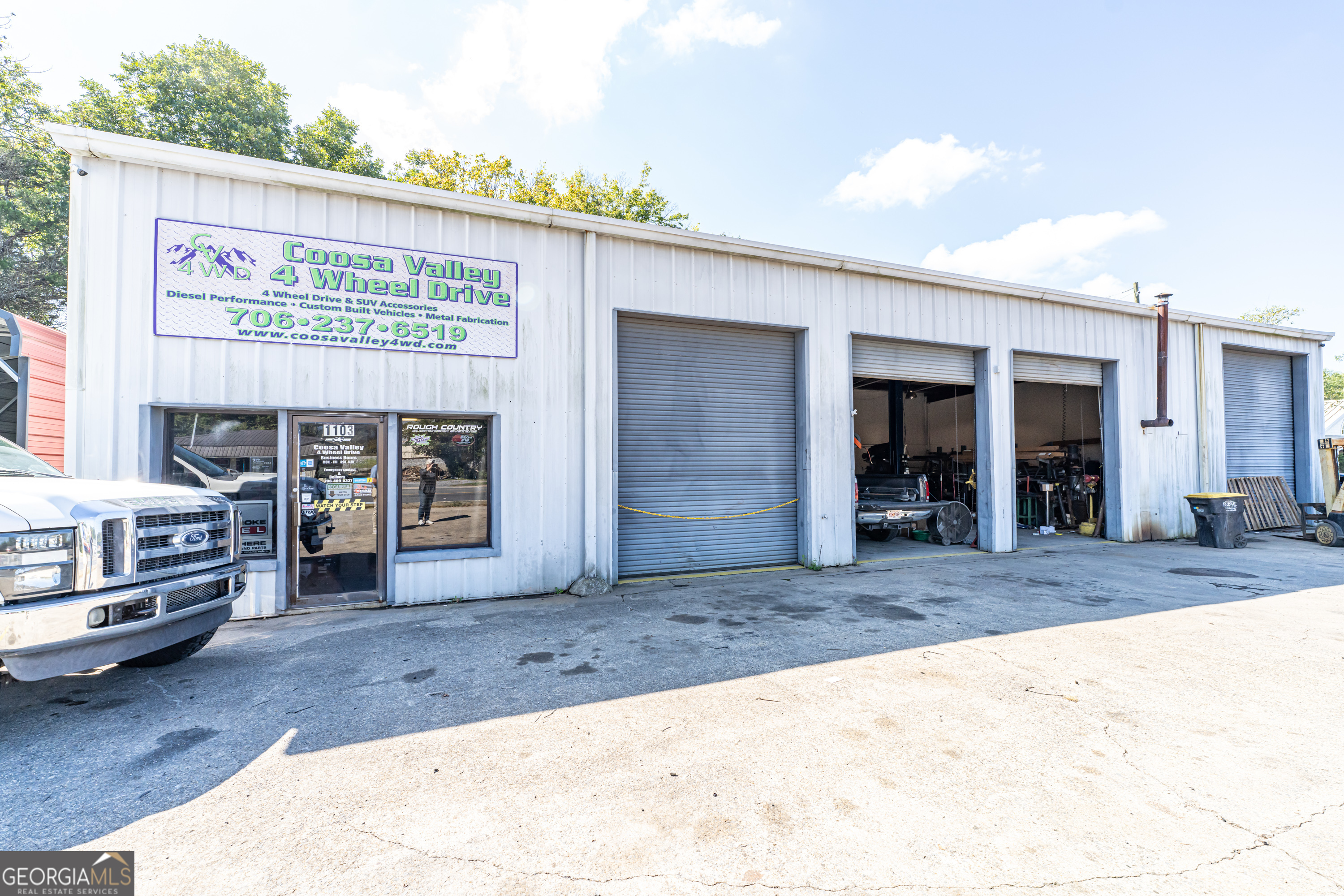 Prime 1.57-acre property zoned for community commercial use, boasting high visibility and a high traffic count with triple road frontage on Shorter Ave, Fay Street, and S Sycamore Street. This versatile space includes a 3,200 sqft automotive shop, two rental houses, one vacant house, and a billboard-ideal for income potential and business opportunities.