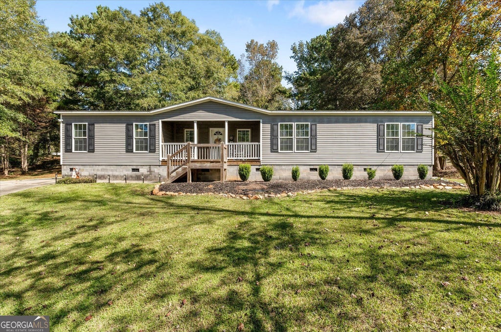 Photo of 215 Navajo Trail, Bowdon, GA 30108 (MLS # 10873208)