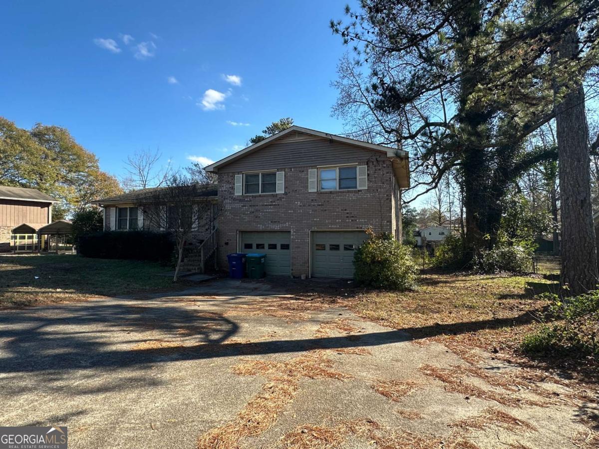 The home is ready for you to make it your own!  Great location!  Four-sided brick split level home in sought after area!  Large fenced in backyard!  Home is perfect for an investor or a homeowner that wants to make this home their own.  Home needs remodel.