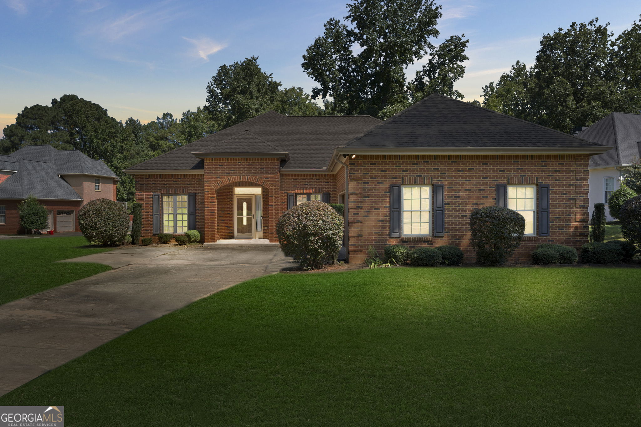 Built in 2014, this home is one of the newest on the block!! This gorgeous 3 bedroom/2.5 bathroom brick home is located on the 18th fairway of the exclusive Georgia National Golf Club in the sought after Lake Dow North subdivision and Ola school district. It offers access to fantastic amenities such as the golf course, clubhouse, community pools, tennis courts, and a fitness center! This home boasts a foyer entry, high ceilings and hardwood flooring. The beautiful kitchen features granite countertops, stainless steel appliances, a breakfast area, and a breakfast bar. Off of the kitchen you'll find large family with vaulted ceiling, crown molding, and recessed lighting. With a formal dining room, office area, a half bath, and mudroom/laundry room, this home offers a stylish, yet functional, living space. The primary bedroom has tray ceilings, a walk-in closet, and an en suite bathroom complete with double vanities, a whirlpool bathtub, and separate walk in shower. With two additional bedrooms and another full bathroom, this home is perfect for a family or hosting guests. Over half of the backyard is wood-fenced and features a stone fire pit. The covered patio, with ceiling fans, is the perfect spot for outdoor entertaining or just relaxing after a long day! Beyond the privacy fence, is a large shaded wood area with a view of the 18th hole. This home is NOT located in Lake Dow Estates, so there is no dam issue/assessment. Sellers have invested over $20k in quality improvements over the last year to make this their dream home! They're only selling due to a job transfer. UP TO $3,000 lender credit if preferred lender is used.