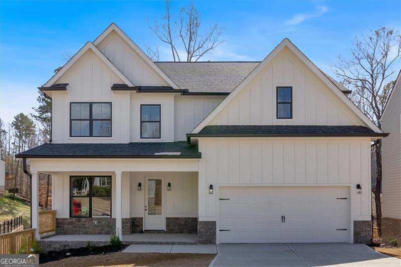 Featuring the "Travis floor plan" features 4 bedrooms, 2.5 baths, along with plenty of open, uninterrupted living space. The Great room is highlighted by a gas log fireplace with views to the kitchen. A haven for cooks, kitchen is equipped with sleek Quartz countertops, high end soft close cabinetry, a large Island, and dedicated breakfast area. Make the most of your space by hosting memorable family gatherings in the formal dining room or relaxing on the back deck. Upstairs, you find an expansive master suite, highlighted by spa-like ensuite master bath with soaking tub and a tile shower, and large walk-in closet. The laundry room is in the second floor for your convenience. Three additional generously sized bedrooms, a full hall bath and linen closet. two-car garage that includes garage door openers. Carter Grove is a well sought after subdivision in Cartersville Ga. This GOLF CART FRIENDLY community includes luxurious amenities including, but not limited to: a large club house, which can be used as an event space or meeting room for residents, gated swimming, tennis, playgrounds, sidewalks, beautiful exterior landscaping, and a short walk to the adjoined Woodland Hills Golf Club. Enjoy the convenience of a short ride to highways, amazing dining, shopping and entertainment in Downtown Cartersville, Red Top Mountain State Park, The Etowah River and Lake Point Station. As an added offer, $5,000 closing cost incentive OR Temporary Rate Buydown when you use our preferred lender, Matt Garcia w/ Supreme Lending .