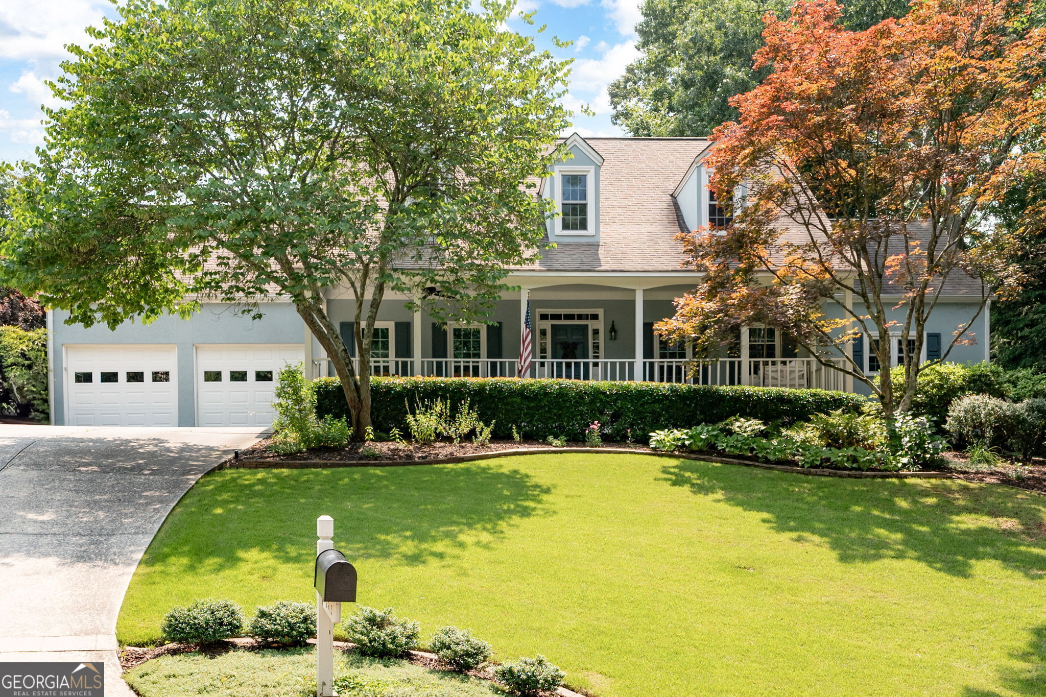 Welcome Home to 2915 Preakness Drive in highly sought after West Cobb swim-tennis community, Saddlebrook. Fall in love with large rocking chair front porch situated on .49 acre lot in quiet cul-de-sac. Home is beautifully landscaped and has been "yard of the month" multiple times. Home features Master Suite on main level with gorgeous, updated spa-like bath to include soaking tub, separate shower, double vanity and heated floors. Main level includes spacious Dining Room-perfect for entertaining or family gatherings, Living Room and Family Room are open to one another. The Sunroom can be used as a sitting room, work out room or playroom while enjoying beautiful view of backyard. Enjoy cooking in updated Kitchen with white cabinets, large center island with breakfast bar and all new appliances, except refrigerator. New tankless water heater installed in 2025. Upstairs offers 3 Bedrooms with 2 Baths and a Bonus Room with closet (could be 5th Bedroom), but perfect for home office, playroom or media room. Upstairs loft area has a desk-makes a great office or study space for kids. Convenient location-Close to Marietta Country Club, Kennesaw National Park with miles of hiking trails, Mount Paran Christian School, shopping, restaurants and more. Just 7 miles to The Marietta Square. Hurry, this home will not last long!