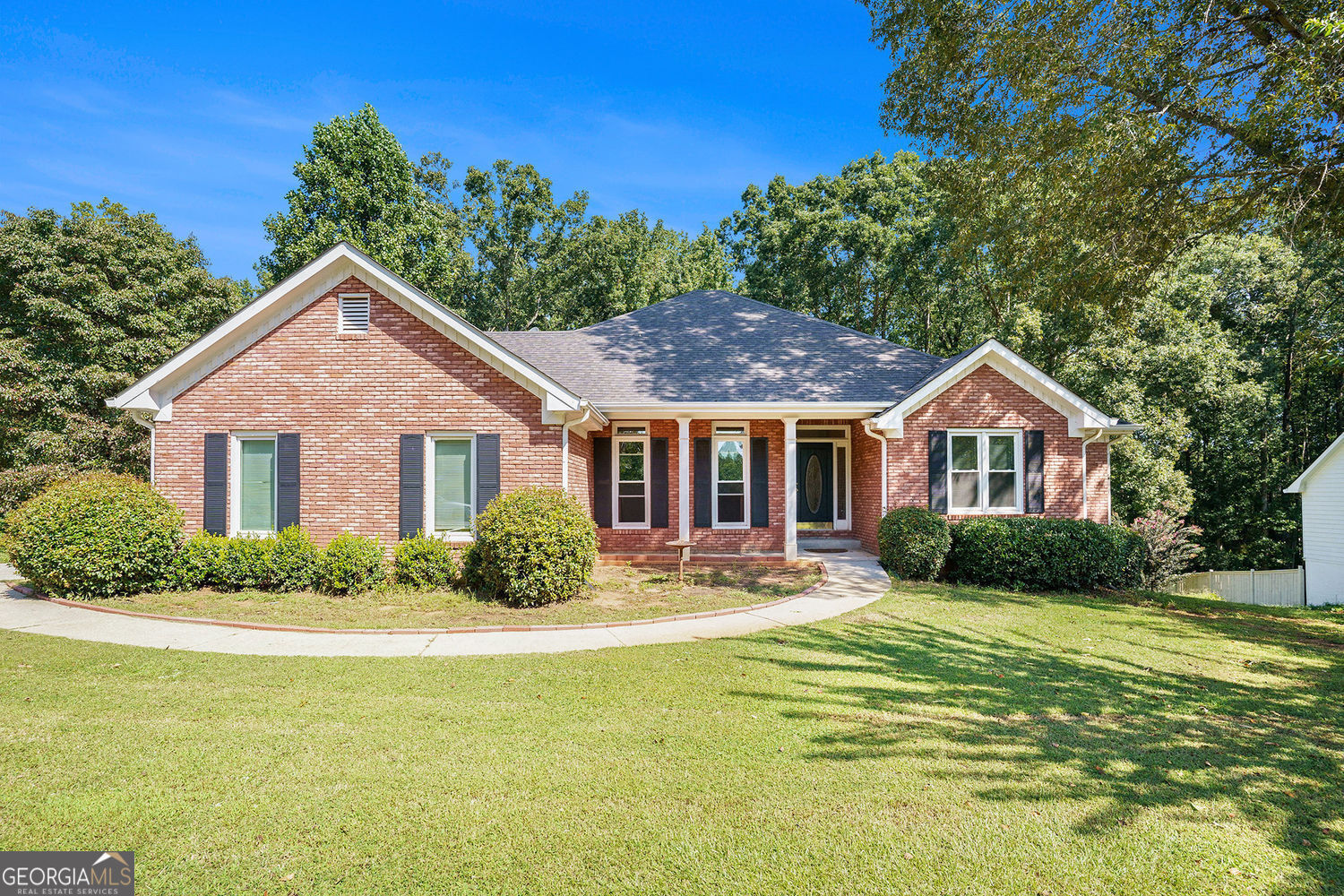 Welcome to your new home at 1020 Thornwood Circle in Covington, GA. This beautiful 4-bedroom, 3.5-bathroom ranch sits on a full BASEMENT and offers space, style, and comfort all in one. The classic BRICK FRONT gives it timeless charm, while the LARGE LOT provides plenty of room to enjoy the outdoors. Step inside to discover updated flooring and a layout designed for easy living. The SPACIOUS KITCHEN is perfect for family meals and has room for everyone to gather. A bright and open floor plan connects the kitchen to the rest of the home, making entertaining a breeze. The MAIN LEVEL includes a lovely OWNER'S SUITE with a private bath and walk-in closet. Two additional bedrooms share a convenient Jack-and-Jill bathroom, and there's also a handy half bath for guests. Head downstairs to the PARTIALLY FINISHED BASEMENT-perfect for extra living space, a game room, or storage. There's so much potential to make it your own. Outside, relax on the sunny deck or explore the big backyard. With over an ACRE of land, you'll have space to garden, play, or unwind in peace. Located in the quiet Thornwood neighborhood, this home combines country comfort with easy access to schools, shopping, and more. Whether you're looking to grow your family or settle into a peaceful space, this home is ready for you.