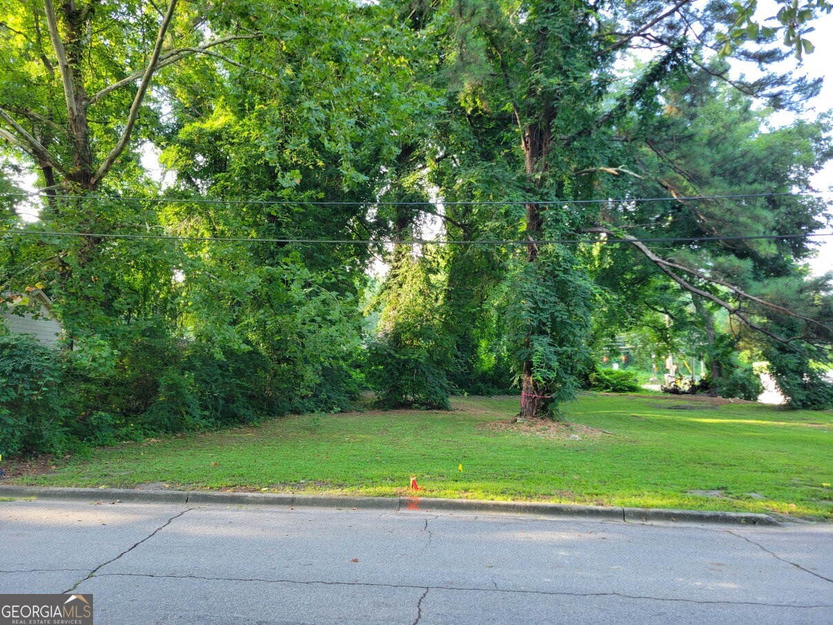 Good opportunity to build in NW Atlanta. Level 50 x 150 rectangular lot with great topography. Zoned R4A. Clear and ready for your building plans. Easy access to downtown, west side attractions, I-285, I-20, and Atlanta airport. No survey available. Buyers should research and confirm zoning details.