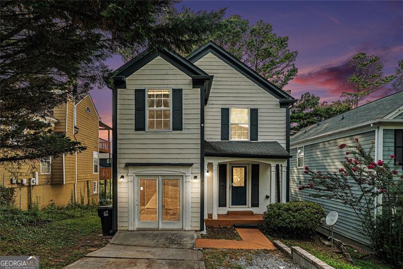 WELCOME TO YOUR NEW HOME!! This fabulous home features 4 bedrooms and 2.5 bathrooms. Home located in greater Lawrenceville with nice oversized master suite & open floor plan plus a GREAT deal of natural sunlight during the day. The kitchen features countertops, stainless steel appliances (fridge, stove, microwave, and dishwasher), a separate open dining area, and a bonus room. This home has LVP flooring. NO HOA. Conveniently located, close to schools, shopping, and restaurants. Easy access to I-85, GA-316, Supermarkets, downtown Lawrenceville & much more!! The rear enclosed porch is perfect for huge parties, entertaining guests, and a gardening shed. It will not last!!! Don't miss this opportunity to own a home in one of Lawrenceville's most convenient and family-friendly areas.