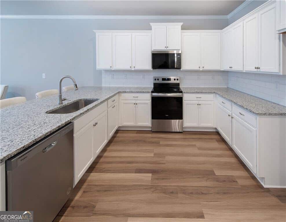 Photo of 5525 Leyland Drive #83, Flowery Branch, GA 30542 (MLS # 10829439)