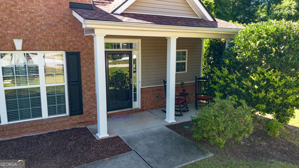Photo of 240 Miracle Lane, Fayetteville, GA 30215 (MLS # 10768704)