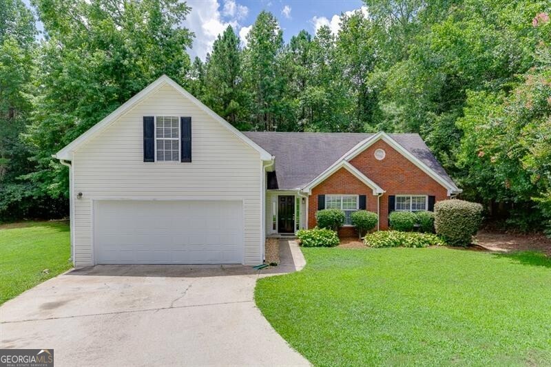 Stunning one-level ranch home located in a highly sought-after Seckinger school cluster! This move-in ready property features fresh interior paint and low-maintenance flooring throughout. The spacious family room offers vaulted ceilings and a cozy brick fireplace, perfect for relaxing evenings. A separate formal dining room adds space for entertaining. The kitchen boasts granite countertops, stainless steel appliances, a pantry, and a bright breakfast area. The oversized primary suite includes vaulted ceilings, a double vanity, garden tub, separate shower, and a walk-in closet. Two additional bedrooms share a full hall bath, and a bonus room provides flexibility for a home office, playroom, or guest space. A generous laundry room adds convenience. Enjoy the large, level backyard-perfect for outdoor fun-located on a quiet cul-de-sac lot. Conveniently situated off Sardis Church Road, with easy access to I-85, Spout Springs Rd, Thompson Mill Rd, Hamilton Mill, parks, schools, and more! ***We DO NOT list rentals on Craigslist nor Market place. Only communicate with The Gwin Team, beware of rental scams - this house is professionally listed by The Gwin Team, ONLY speak with a member of The Gwin Team***