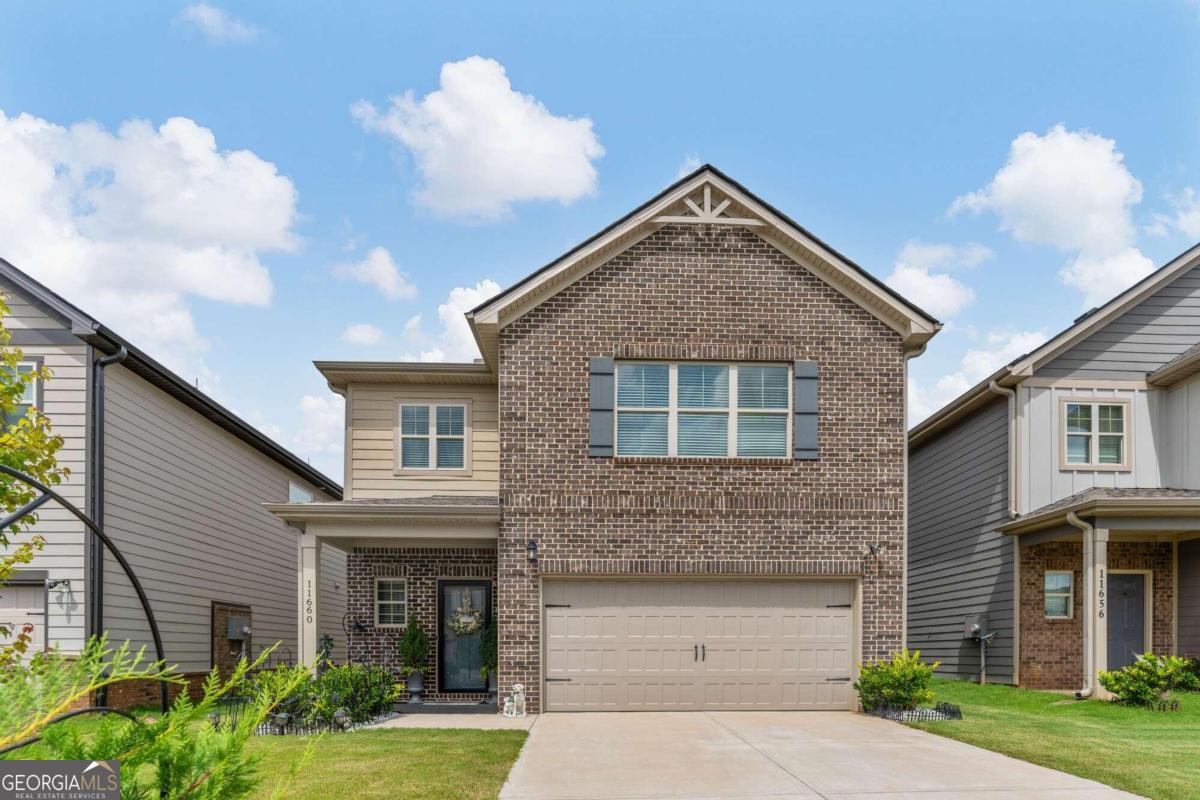 Better than New Construction! Spectacular new listing with upgrades galore and Seller and Lender Incentives! Welcome to your luxurious retreat in Hampton, GACothis stunning 4-bedroom, 3-bathroom home offers the perfect blend of luxury, comfort, and style in a desirable neighborhood. Key features include the exclusive, sold-out Zoey II floor plan, providing an exceptional living experience. The outdoor oasis boasts a massive backyard retreat with a 16x20 covered patio and a ceiling fan, perfect for entertaining or relaxing in privacy within the fenced yard. Inside, the grand foyer sets the tone for the elegance within, leading to a gourmet kitchen with a large island with bar seating, sleek stainless steel appliances, and ample counter space for casual dining and entertaining. The main floor suite, ideal as a secondary master or in-law suite, comes with an ensuite bathroom and walk-in closet. Upstairs, the spacious primary bedroom features a lavish ensuite bathroom with a double vanity, separate soaking tub, and shower. The versatile loft offers flexible space for relaxation or entertainment, accompanied by two additional bedrooms and a full bathroom. Additional upgrades include blinds throughout for added privacy and comfort and a spacious, versatile layout that accommodates various lifestyles and preferences. This home rivals new construction with its exceptional outdoor space, luxurious interiors, and an exclusive incentive. Don't miss your chance to own this extraordinary property, schedule your showing today and experience the unparalleled charm and elegance of 11660 Stovall Pl.