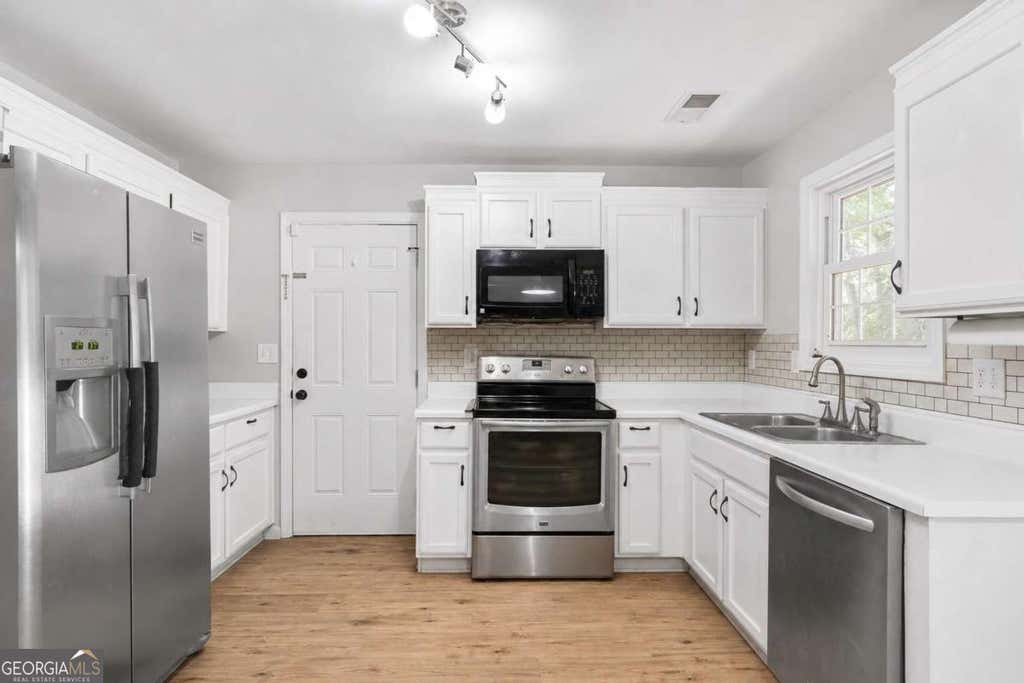 Photo of 5775 River Ridge Lane, Sugar Hill, GA 30518 (MLS # 10820683)