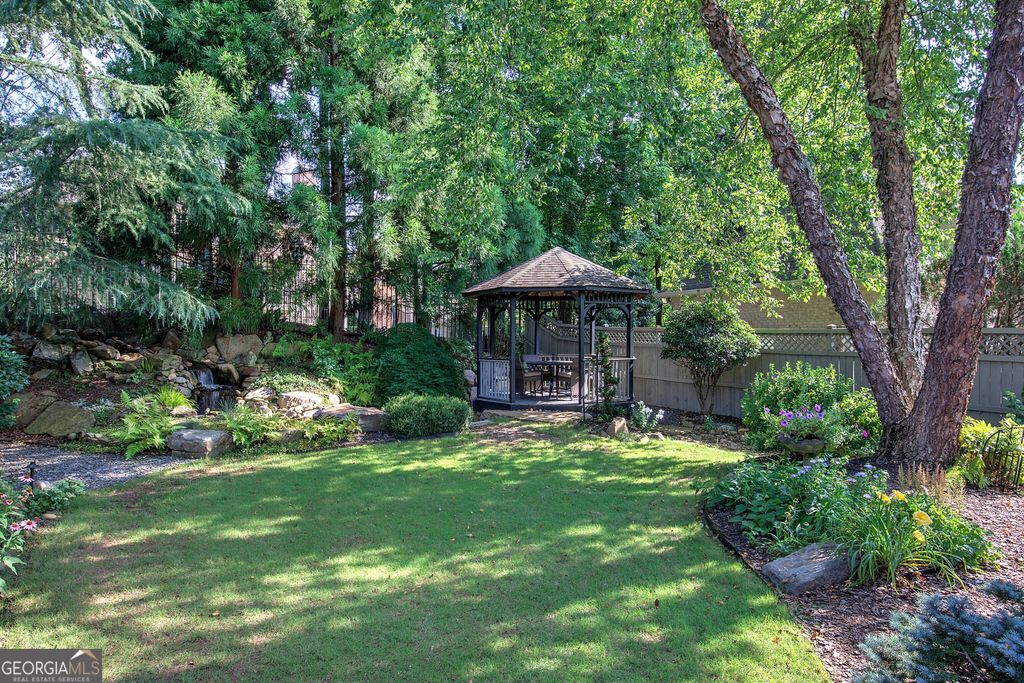 Photo of 2160 Kensington Gates Drive NW, Kennesaw, GA 30152 (MLS # 10662409)