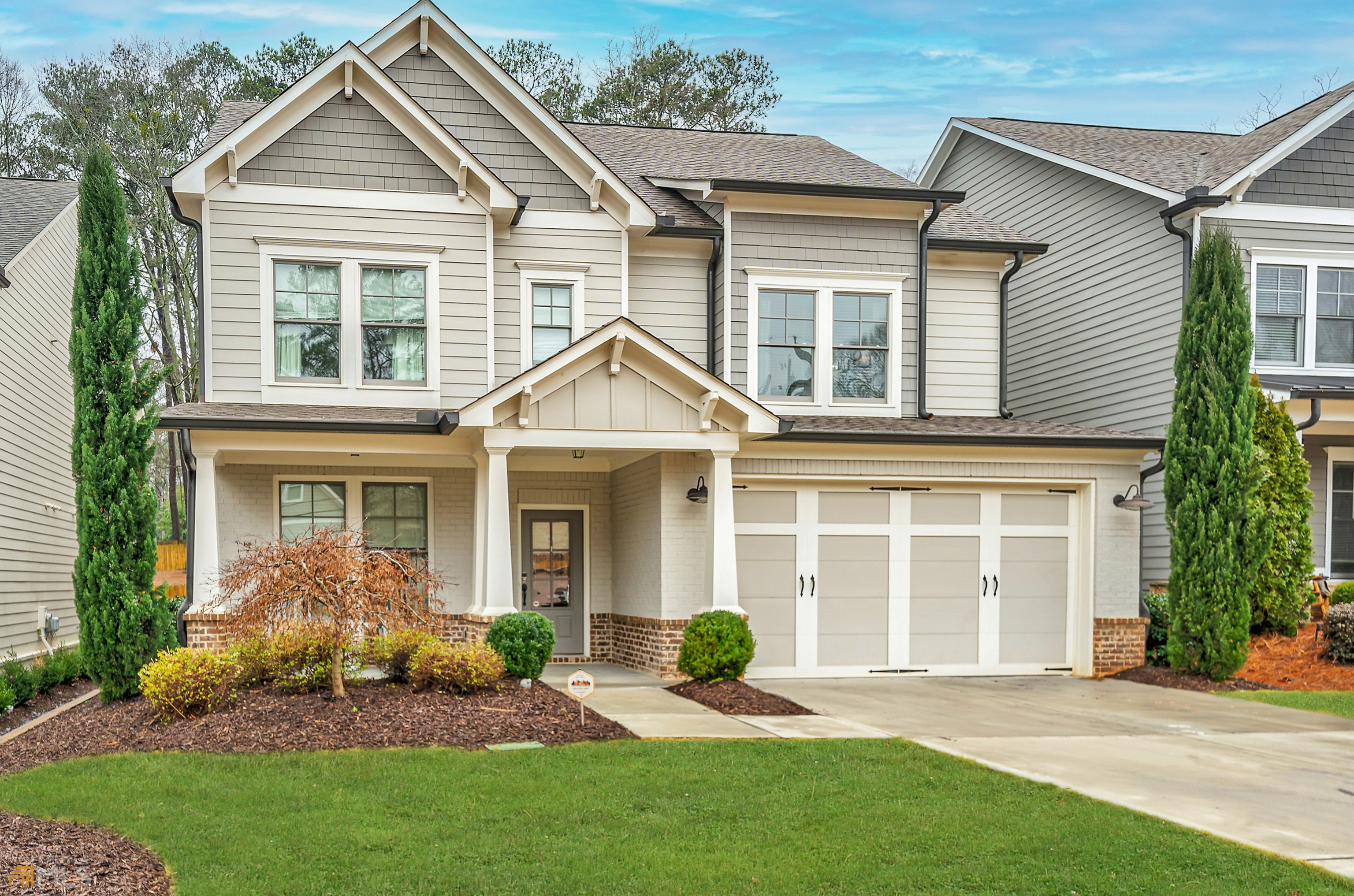Beautiful newer construction home featuring modern farmhouse flair, located on a charming residential street in the trendy Chamblee/ North Brookhaven area inside 285.  Built in 2017, this wonderful home is in excellent condition and feels like new!  The inviting covered front porch is perfect for rocking chairs and welcoming guests.  A spacious open floor plan with 10-foot ceilings on the main level makes the home feel bigger while providing functional rooms that accommodate today's lifestyles.  Prepare meals in the gorgeous kitchen with lots of natural light, custom white cabinetry, expansive center island, stainless steel farm sink, quartz countertops, double ovens, gas range cooktop with range hood, and walk-in pantry.  Enjoy versatile space for casual dining in the breakfast area or convert to a cozy keeping room. Entertain guests on special occasions in the formal dining room. Work from home in the private study strategically located separately from the main living area comprised of the kitchen, breakfast/ keeping room, and family room. The comfortable family room is highlighted by a brick fireplace and built-in cabinetry with shiplap accent wall.  Four spacious bedrooms, 3 full baths, plus a laundry room are located on the upper level.  The Primary suite is oversized and includes a luxurious bath with separate soaking tub, enormous shower, dual vanities, and two custom walk-in closets.  Appreciate the outdoors year- round in your covered and screened porch with fireplace overlooking the large and level fenced backyard.  Plenty of room to add a pool.  This amazing home is located near sought-after schools, excellent shopping and numerous parks.  Easy access to major roads including I-285, I-85 and GA400 plus the convenience of a local Marta Station.  This incredible home will not last long! (Note: Dormant grass has been edited to show how it will look when green.)
