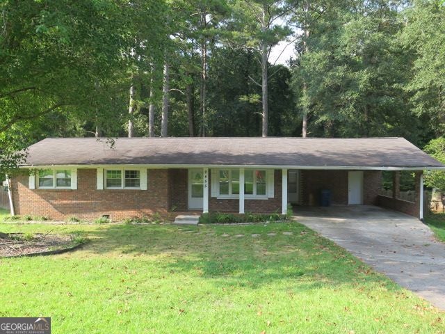 Photo of 2455 Thornton Drive, Atlanta, GA 30349 (MLS # 10839803)