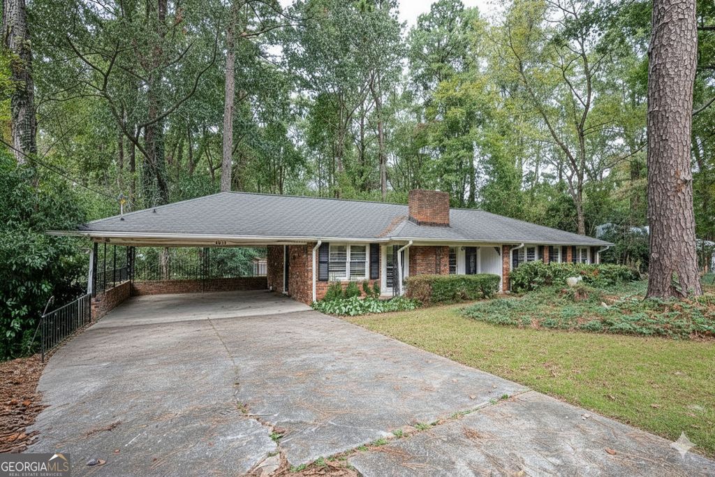 Photo of 5860 Greenbrier Road NE, Atlanta, GA 30328 (MLS # 10640669)