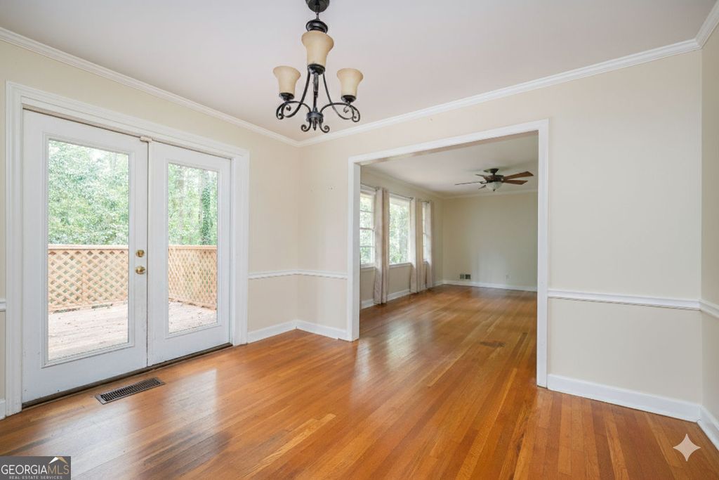 Photo of 5860 Greenbrier Road NE, Atlanta, GA 30328 (MLS # 10640669)