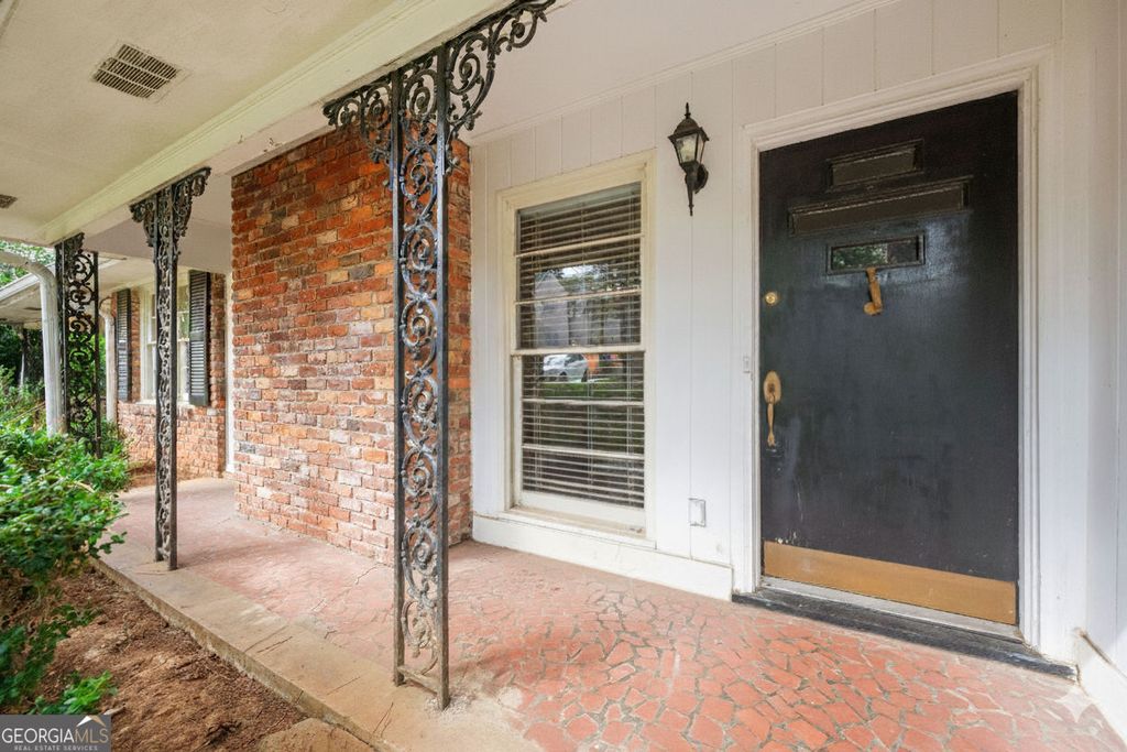 Photo of 5860 Greenbrier Road NE, Atlanta, GA 30328 (MLS # 10640669)