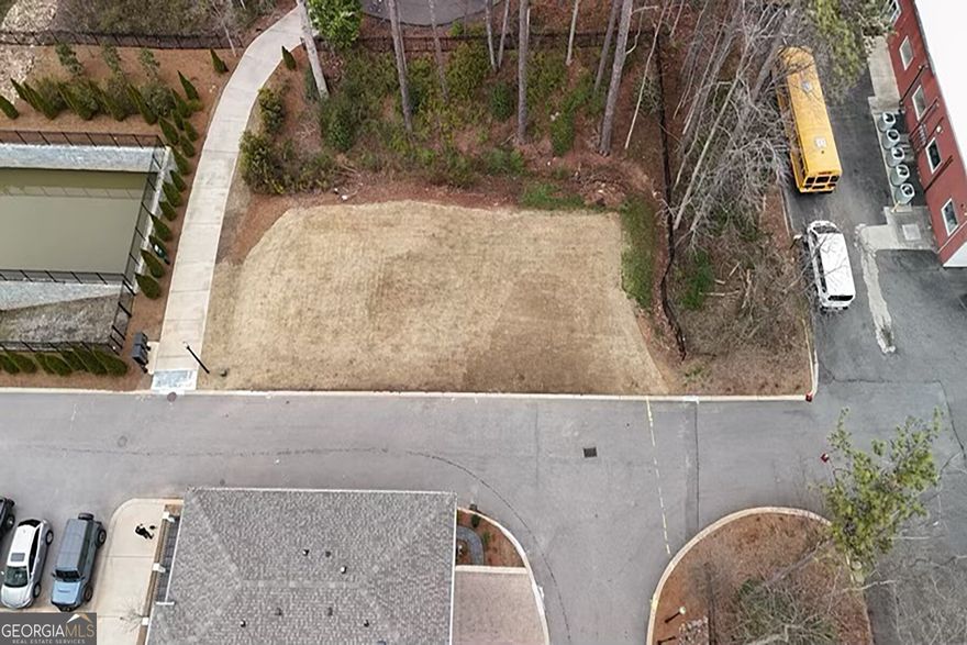 Build your dream home on this prime lot in Alpharetta. Situated in the Villa Magnolia development. Amazing proximity to The Maxwell, downtown Alpharetta, and backs up to Wills Park. This lot provides the perfect canvas for your home vision. Don't miss out on this rare chance to own a piece of Alpharetta and create the lifestyle you've always wanted. Bring your own builder.